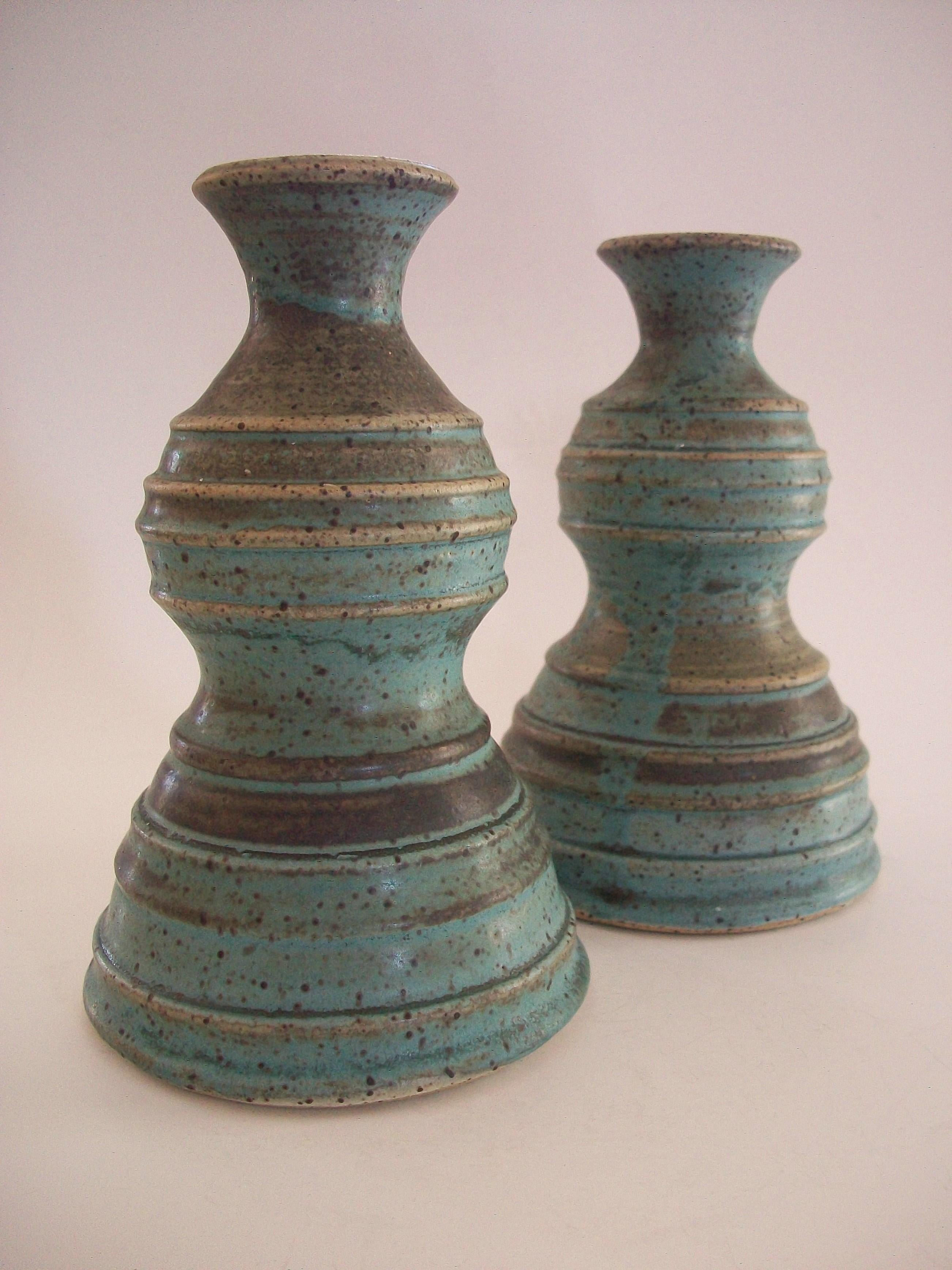 ALISON FENIAK - Mid Century studio pottery candle holders - intermingled matte turquoise and brown glazes - hand made / wheel thrown - each signed and dated on the base - Canada - circa 1956.

Excellent / mint vintage condition - no loss - no