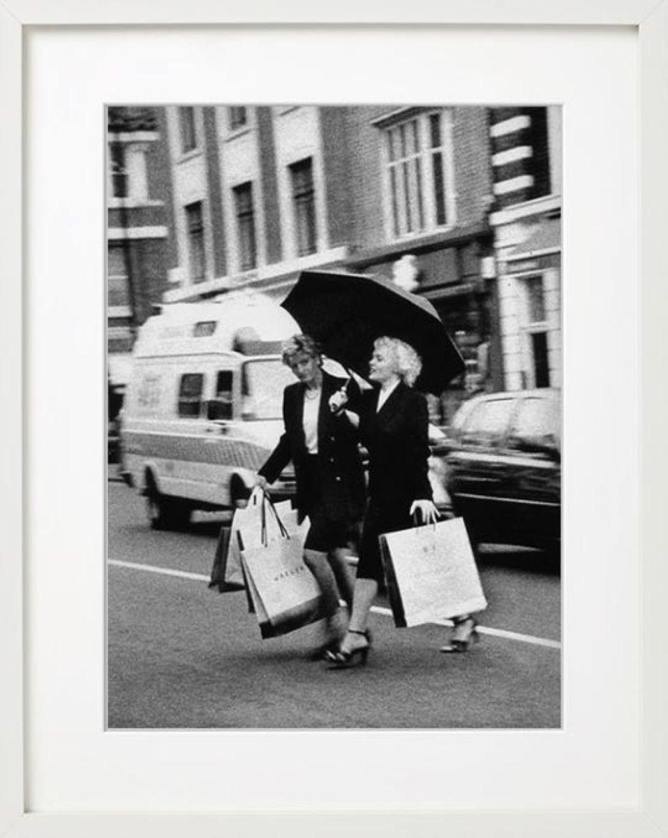 Diana and Marilyn Shopping, 2001 - this famous women walking with the umbrella - Photograph by Alison Jackson