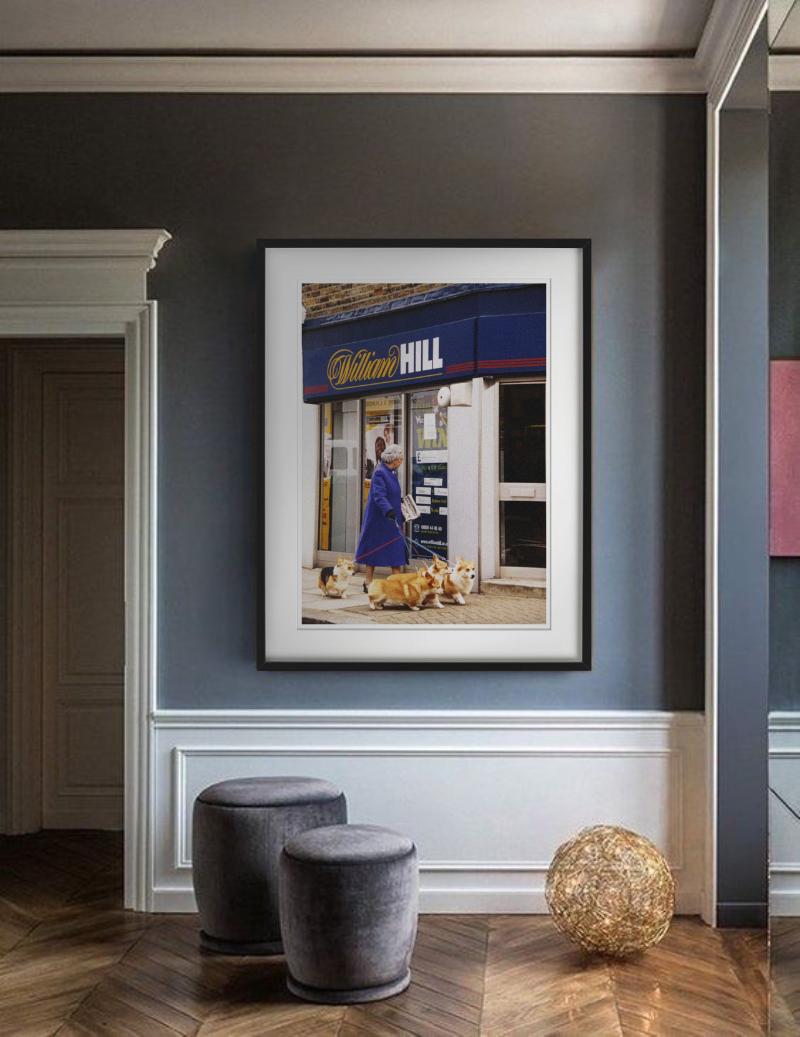 The Queen in a blue Coat walking her Corgies infront of a William Hill store - or is it really the Queen? Photographed by Alison Jackson in 2003.

All prints are limited edition. Available in multiple sizes. High-end framing on request.

All prints