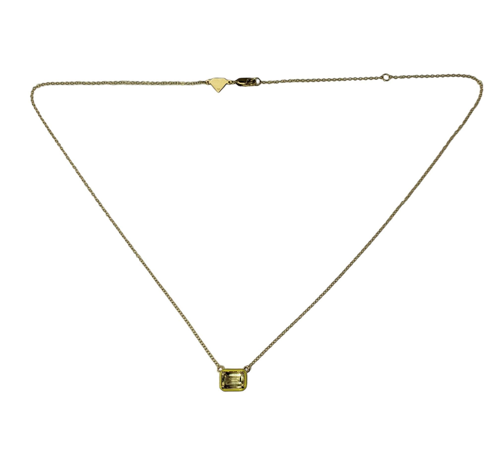 Vintage Alison Lou 14K Yellow Gold Lab Created Citrine and Enamel Necklace-

This elegant pendant by Alison Lou features one rectangular lab-created citrine accented with yellow enamel and set on a delicate 14K yellow gold necklace.

Citrine weight: