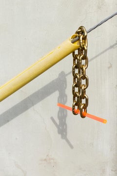 Suggesting a Connection - bright yellow documentary style photo of chain (12x18)