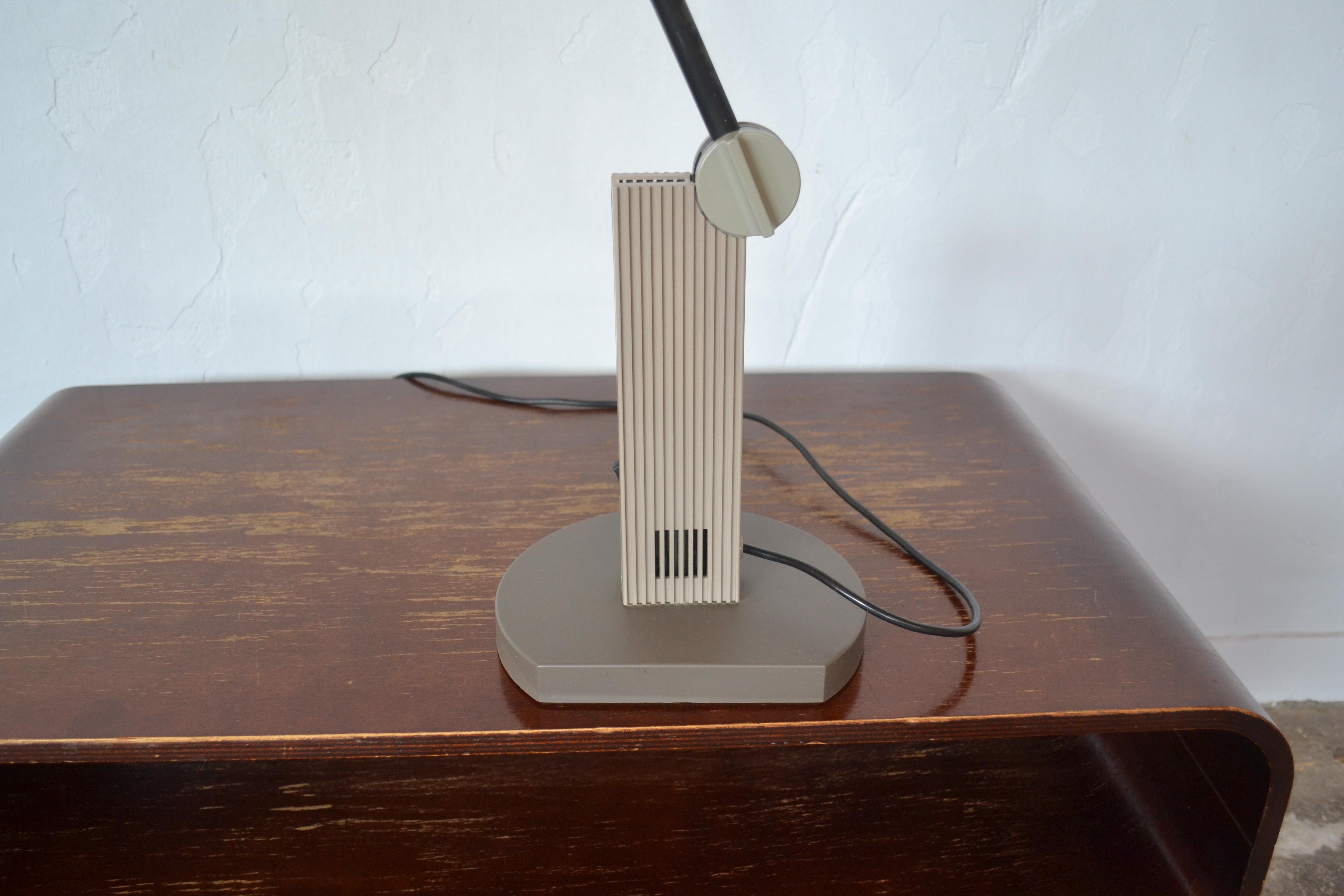 This Artemide model Alistro lamp was designed by Ernesto Gismondi in 1983.