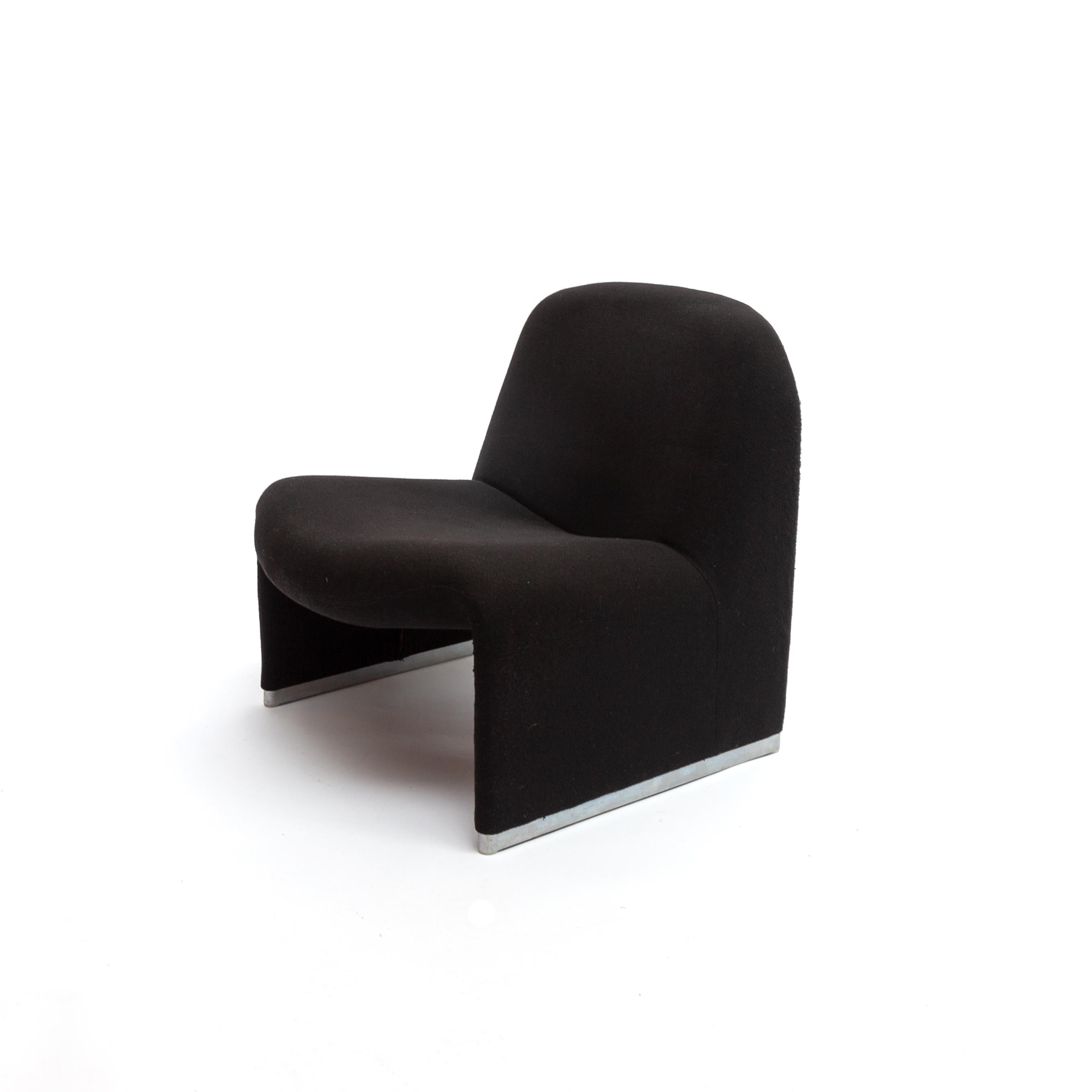 Black Alky armchair by Giancarlo Piretti. Produced by Castelli in Italy in the 1970s. Very comfortable. In original black Van Der Ploeg Wool fabric. The item is in good vintage condition. Its organic shape creates a great comfort.