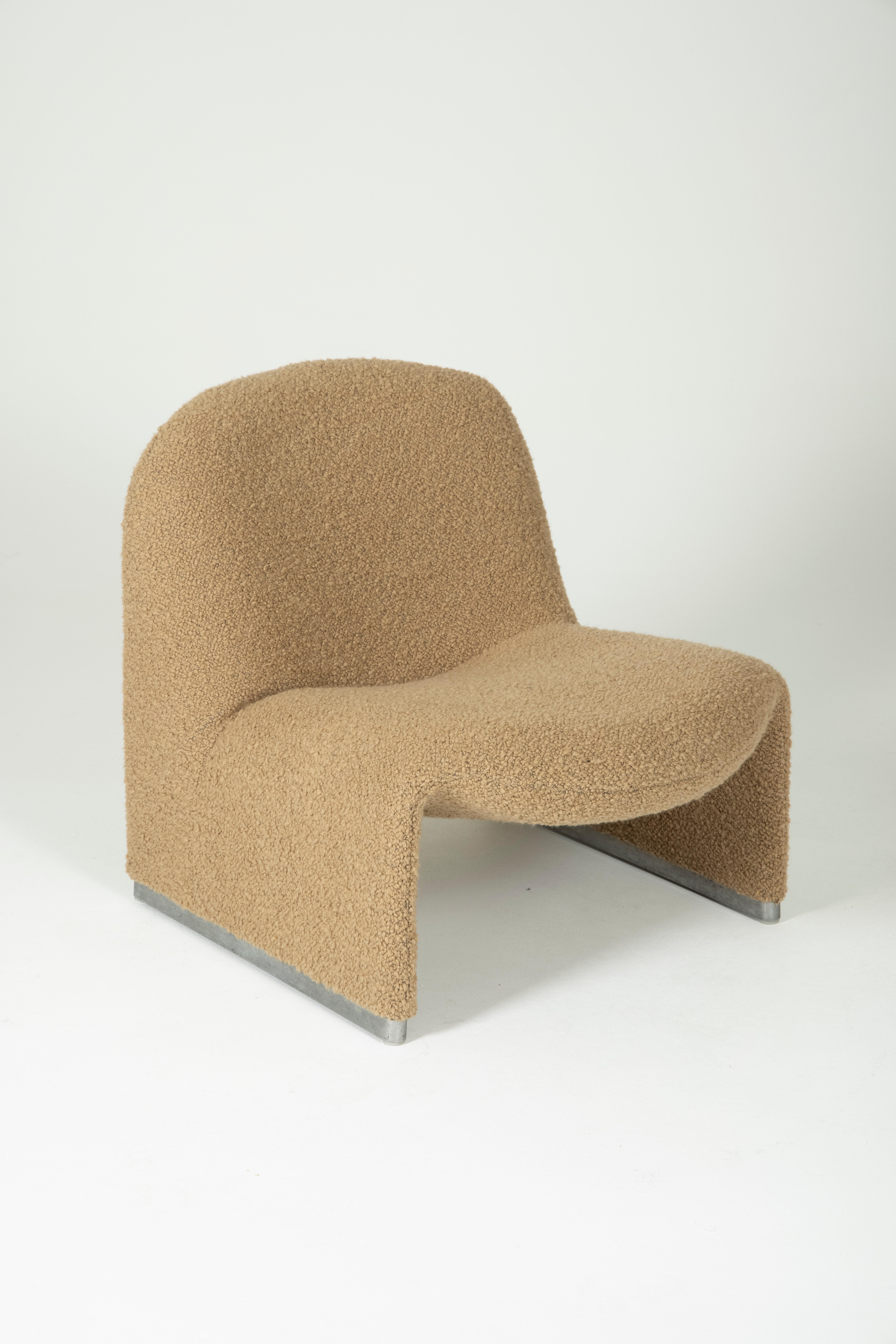 Alky armchair by Italian designer Giancarlo Piretti for Artifort, 1970s. The structure is covered with thermoformed foam, and the base is made of aluminum. Good condition. This armchair has been reupholstered with a high-end bouclé fabric in shades