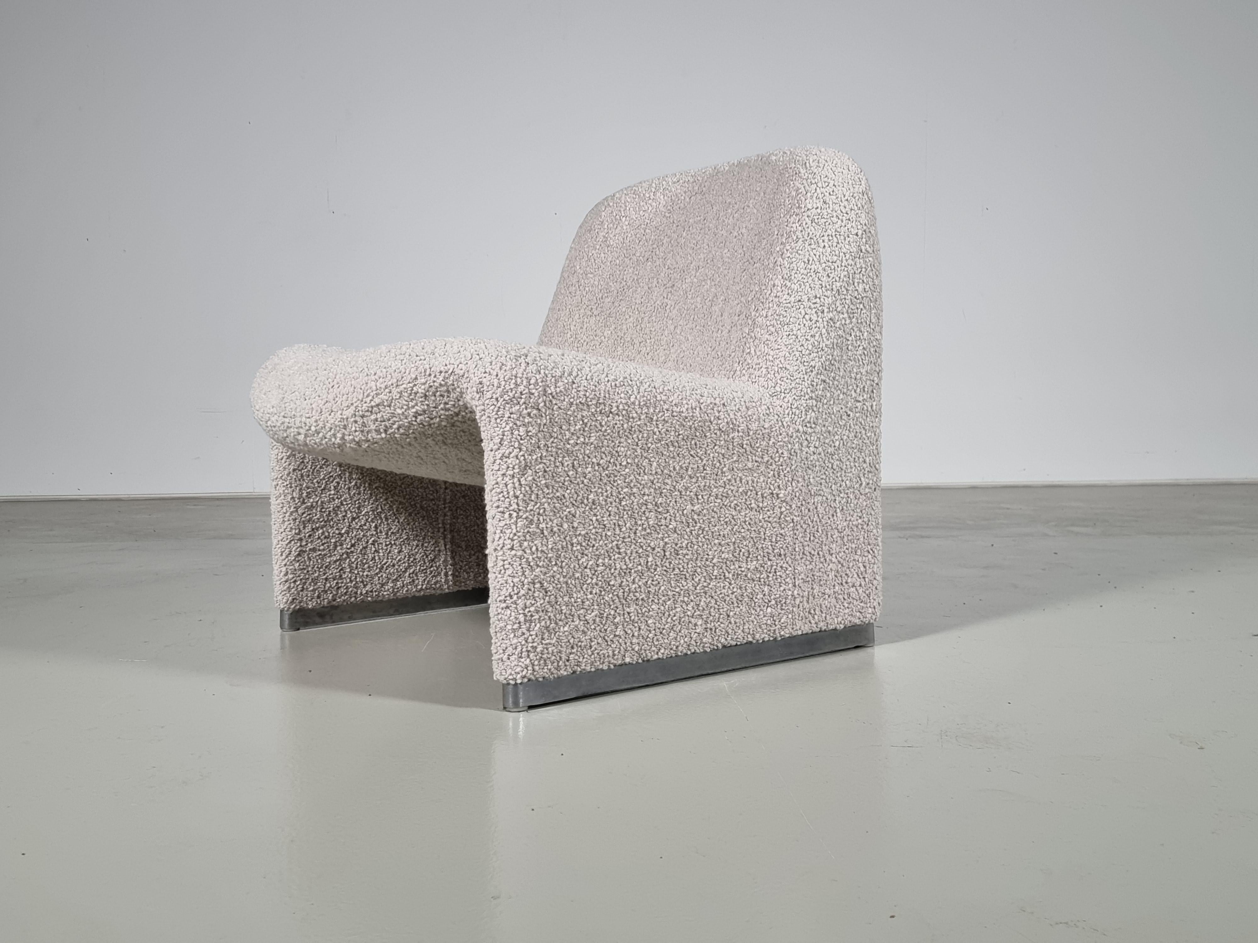 Alky chair by Giancarlo Piretti for Castelli, 1970s. Reupholstered in a beautiful beige high-quality nimbus boucle by Dedar. Aluminum frame and polished chrome footrests. Beautiful organic curves are reminiscent of Pierre Paulin's designs.