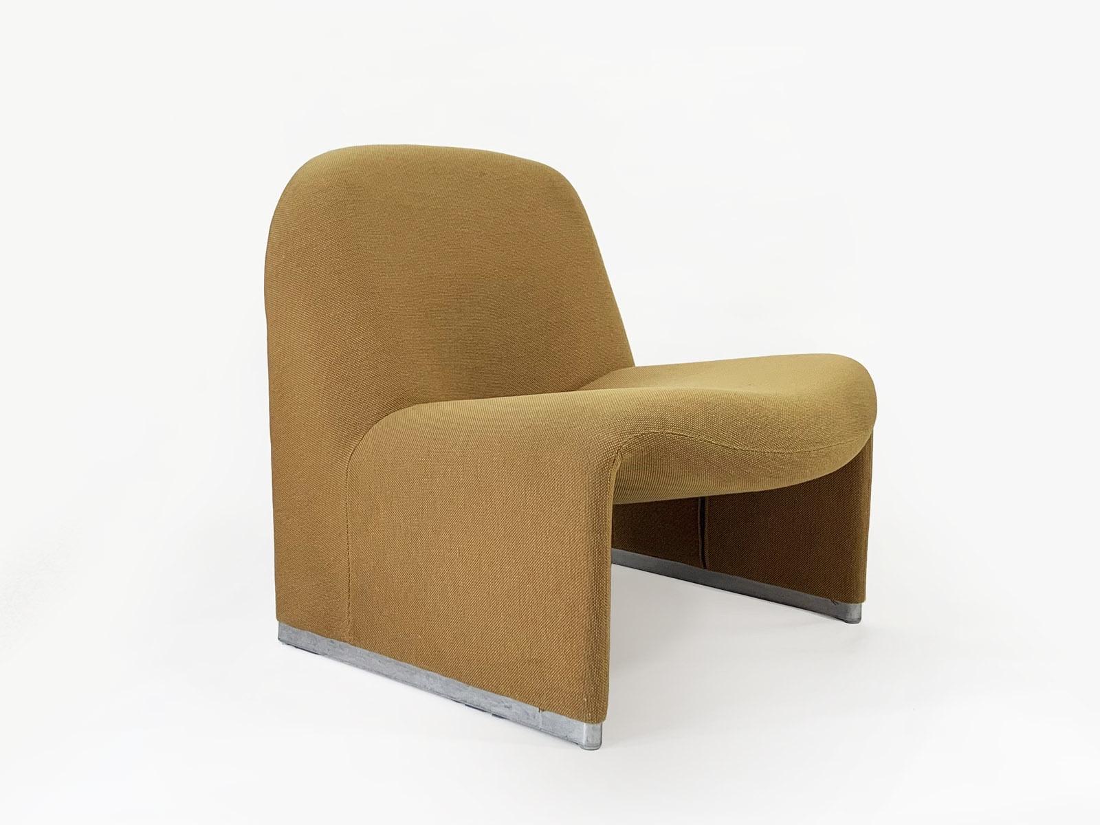 Iconic Alky chair designed by Giancarlo Piretti for Anonima Castelli (this one is produced by Artifort Holand)
Foam interior on steel construction, upholstered in yellow fabric. 
The foam is in pristine condition, the upholstery has some spots,