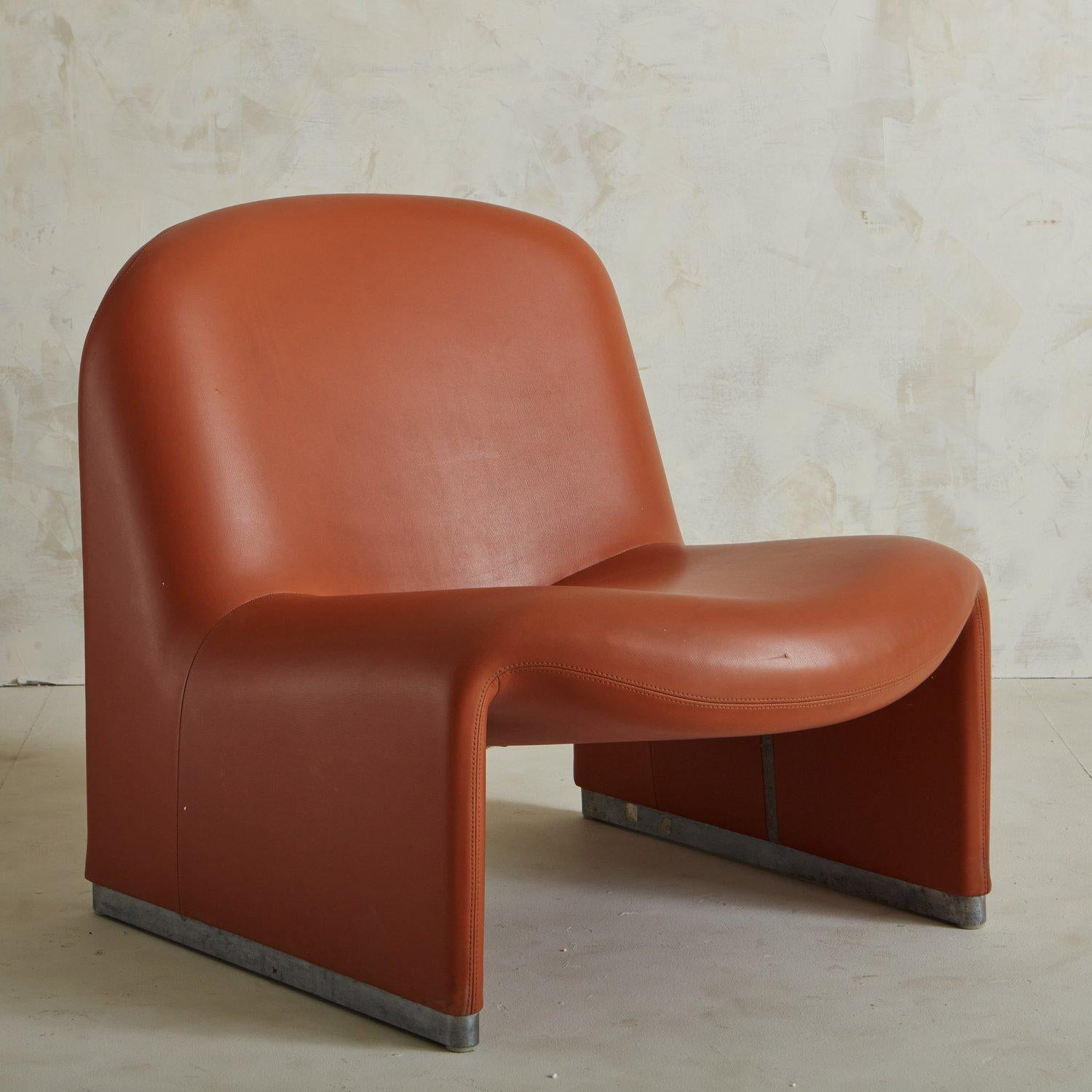 The Alky chair was designed by Giancarlo Piretti for Castelli in 1969. Sculptural, fantastic modern design - the Alky chair was exhibited with the Piretti Collection at NeoCon in 1988. This chair looks amazing from every angle and floats beautifully