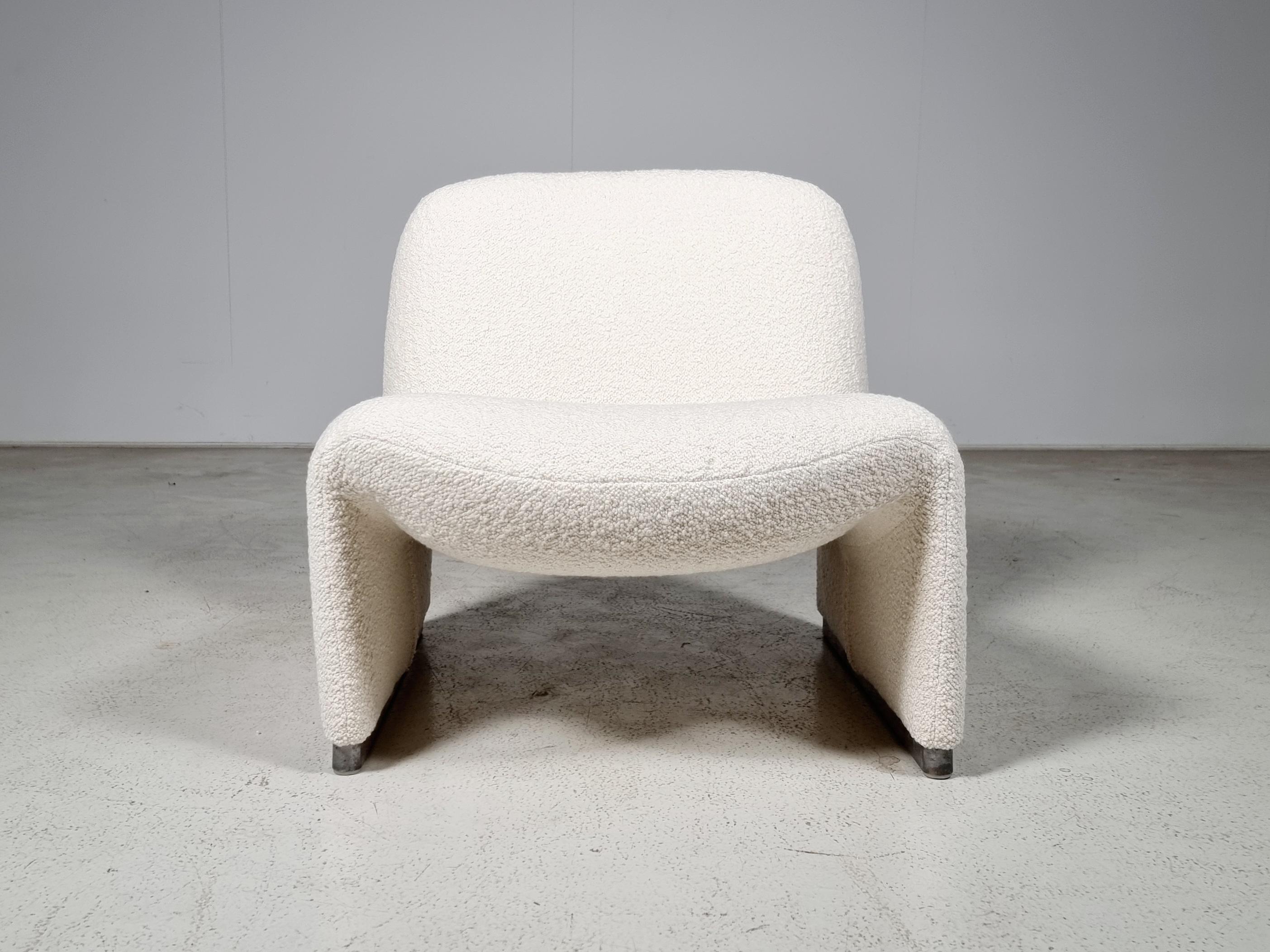 Giancarlo Piretti designed the lounge “Alky” chair. Reupholstered in a high-end boucle by Dedar Milano. Aluminum frame and polished chrome footrests. Beautiful organic curves are reminiscent of Pierre Paulin designs. Produced by Castelli and