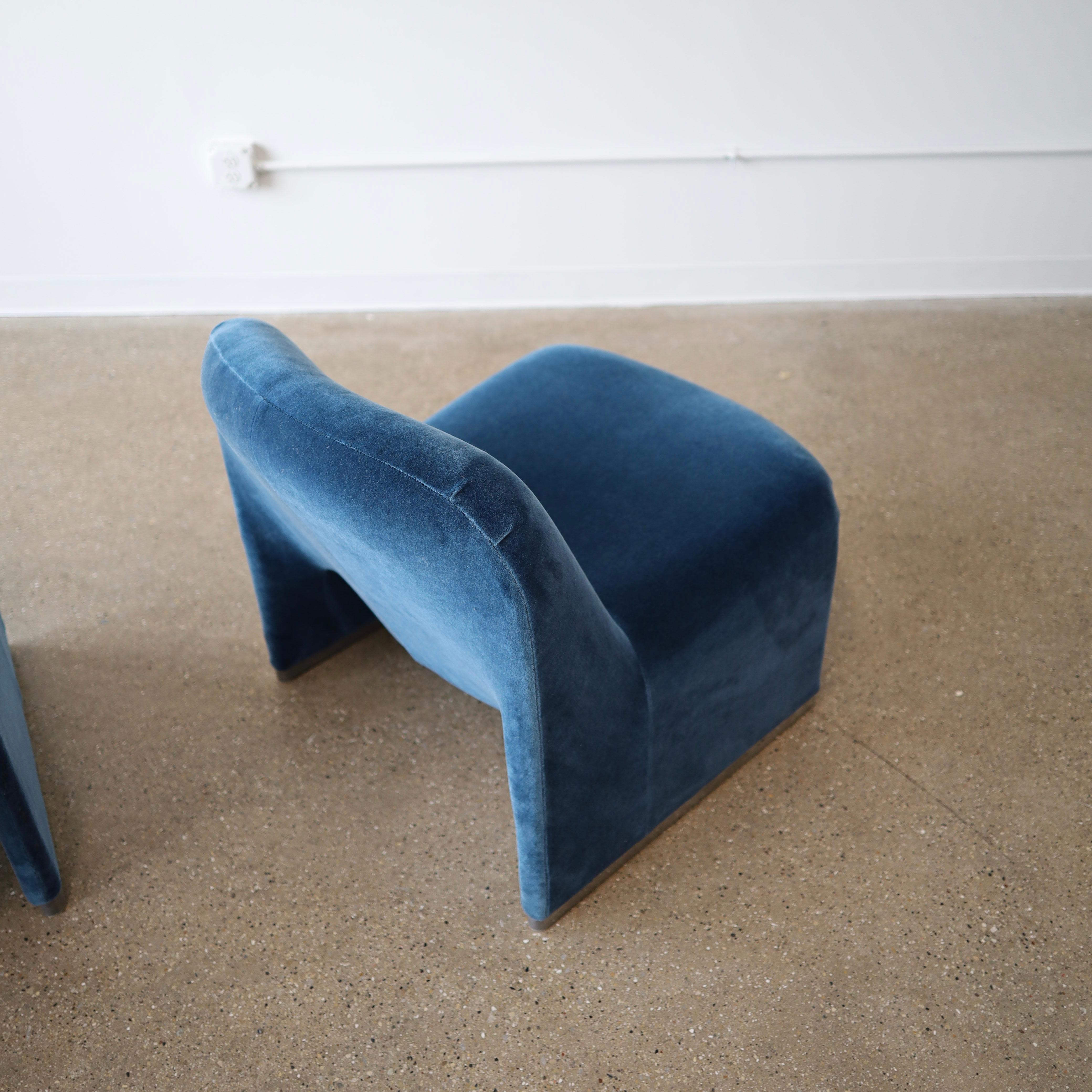 c. 1970s in excellent vintage condition. Both have been fully reupholstered in mohair. There is minor corrosion on the chrome bases but no other notable condition issues
