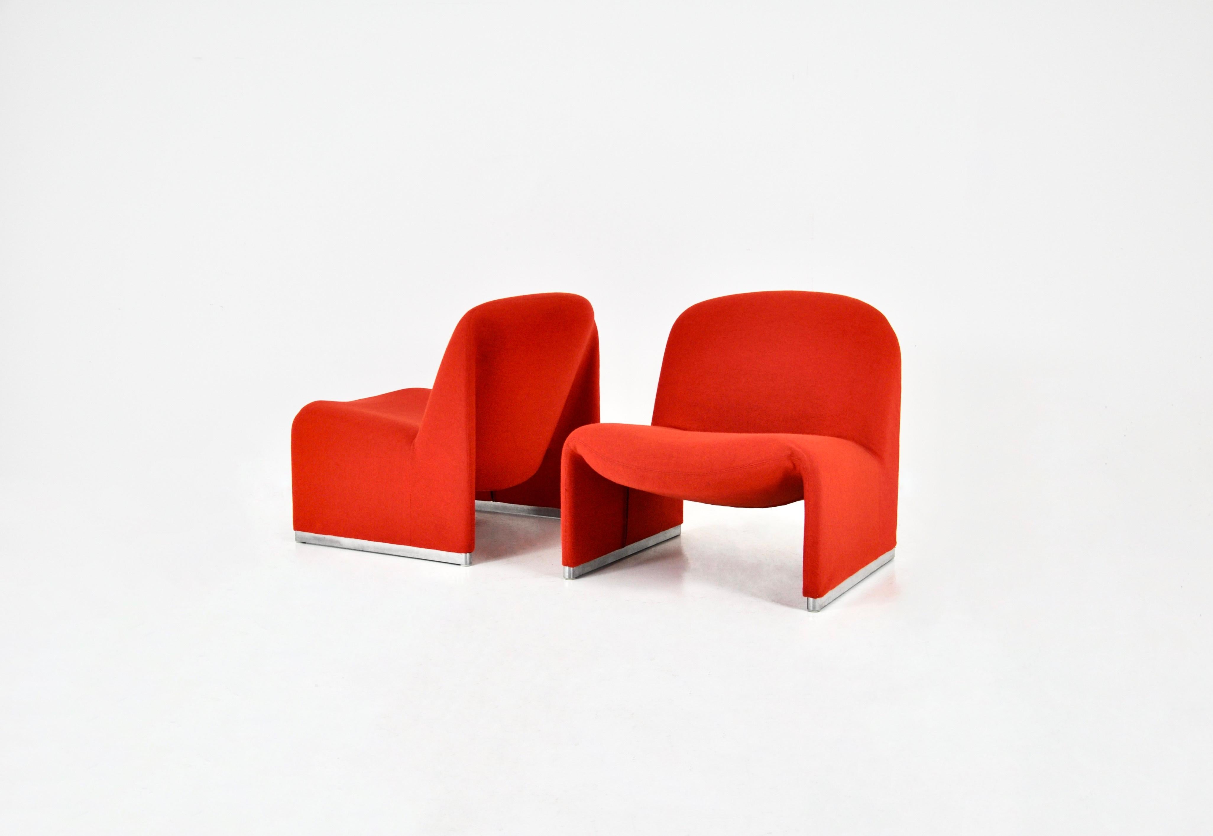 Pair of alky chairs in red fabric. Seat height: 37cm.  Wear due to time and age. 