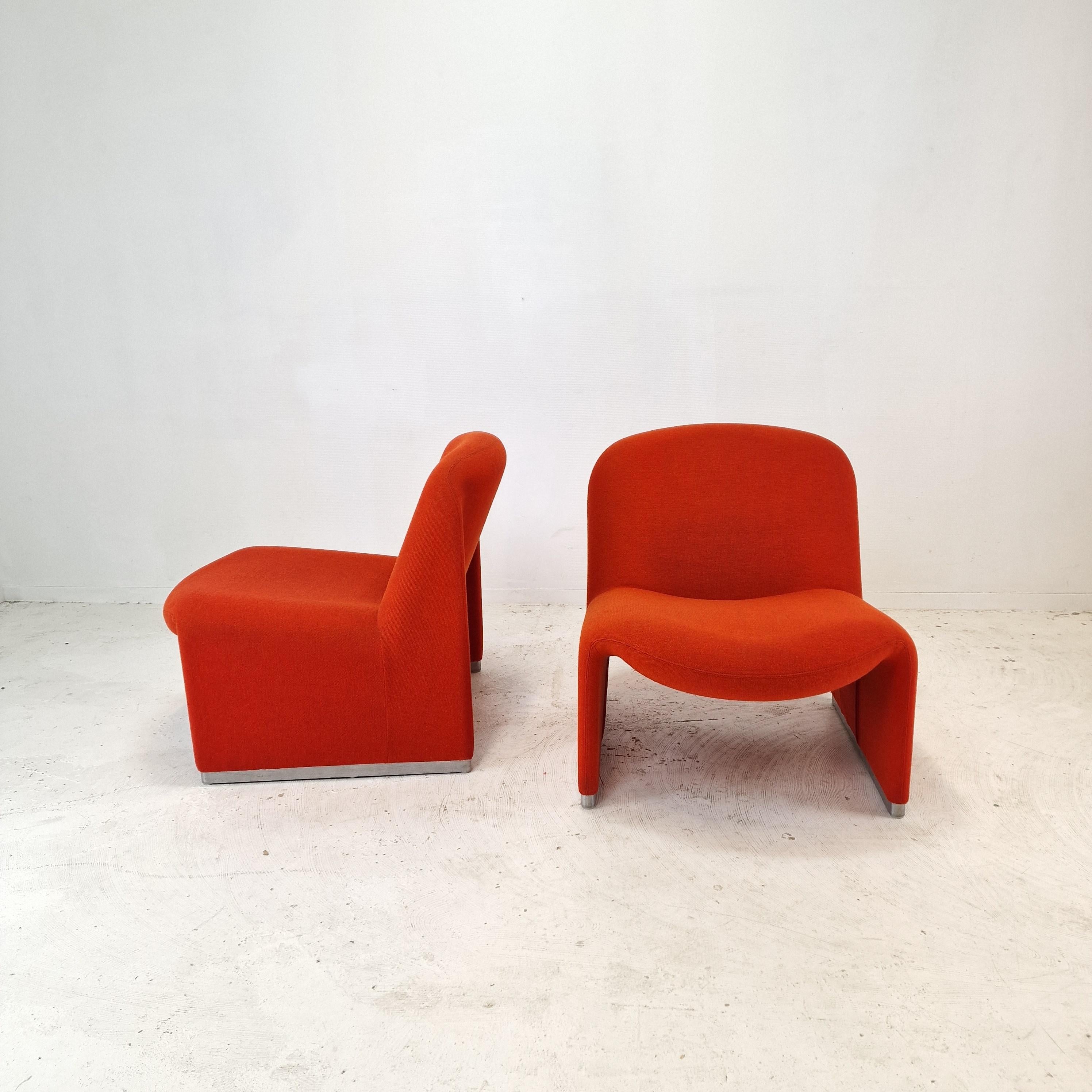 Lovely and comfortable Alky chair. 
Designed by Giancarlo Piretti in 1969, produced by Castelli Italy. 

Both chairs have the original wool fabric, color red.
The chairs are professionally cleaned, the fabric is in good condition.

The price is for