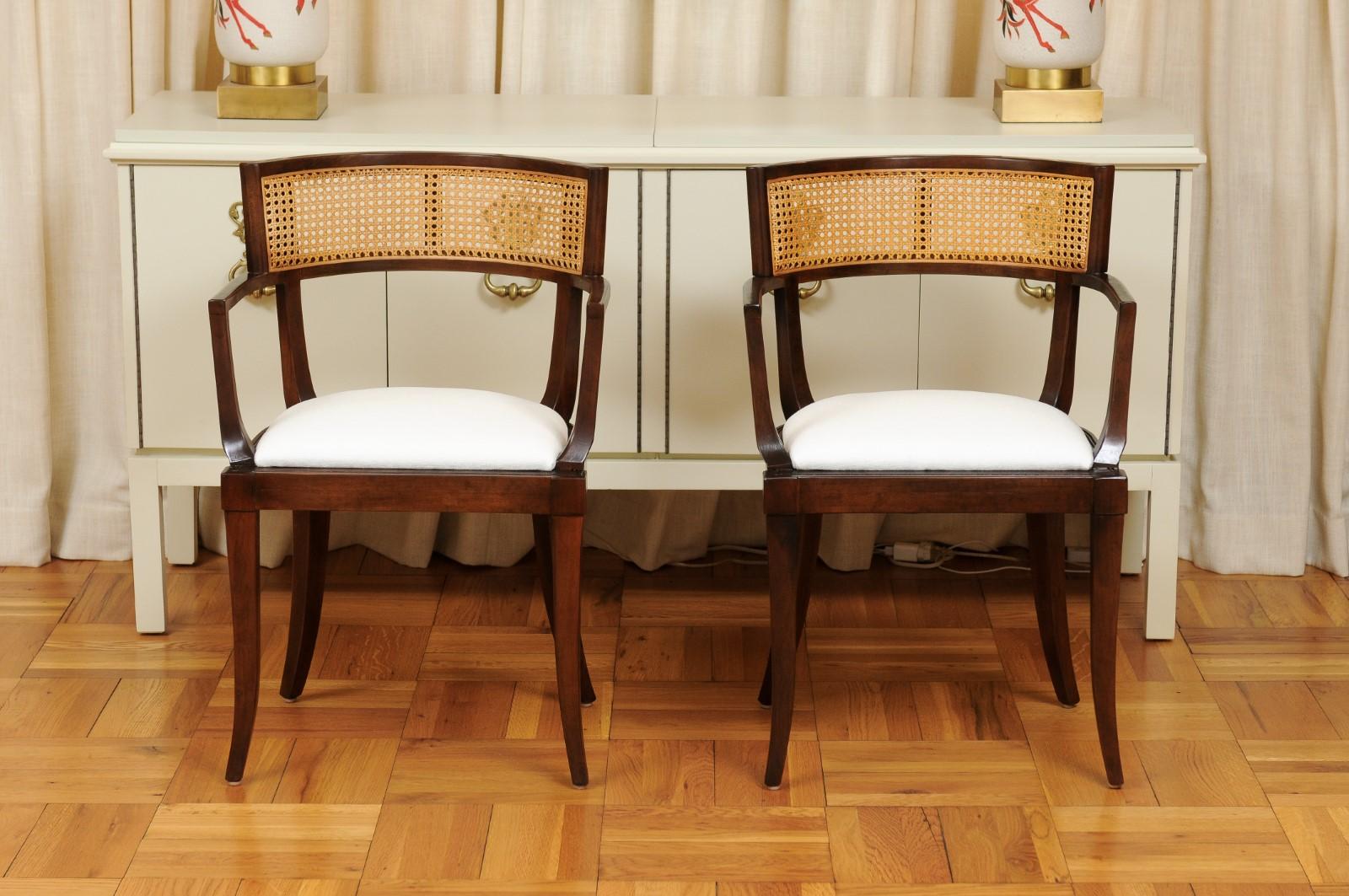 These magnificent dining chairs are shipped as professionally photographed and described in the listing narrative, completely installation ready. This large All Arm set of difficult to find examples is unique on the market. Seats may be caned if