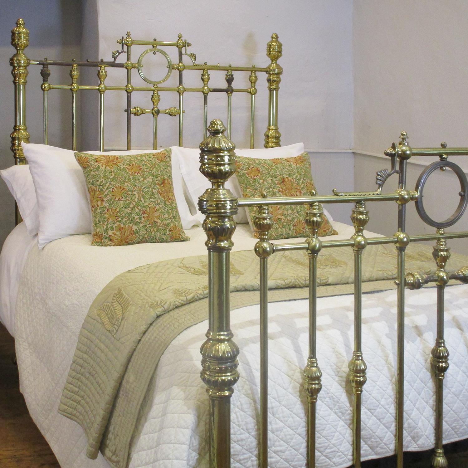 A superb top quality all brass Victorian antique bed with decorative brass fittings, and gallery feature with central ring.

This bed will accept a Double Size 54 inch wide base and mattress set.
We can also extend the bed out to US Queen size and