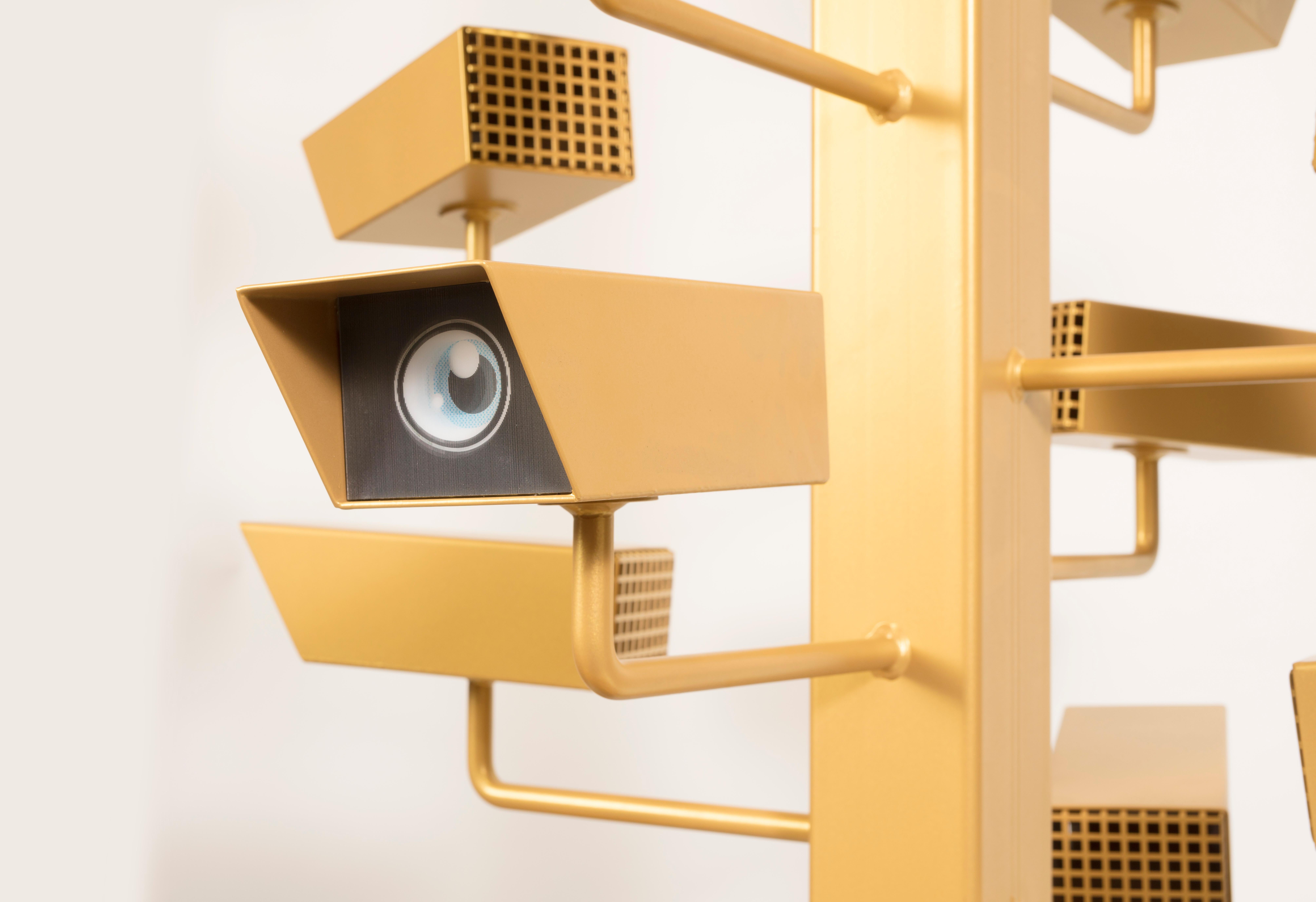 Nothing goes unseen anymore. Anonymity is history. And secrets do not exist. How safe do you feel?

This sculpture raises questions about privacy, personal space, and the boundaries of surveillance in our contemporary society. 
It reminds us of the