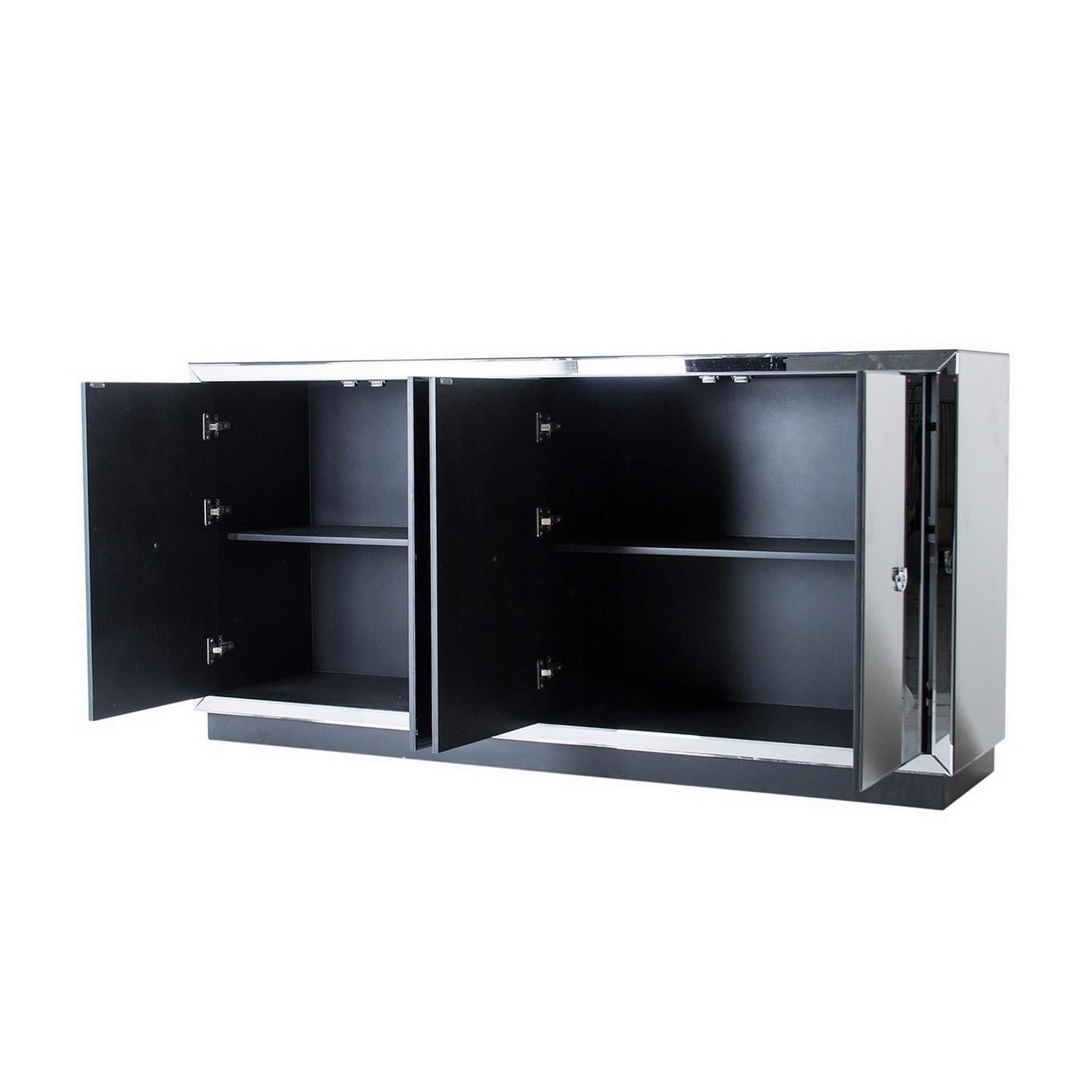Sparkling and sophisticated mirrored sideboard with chrome finish handles, four mirrored graphic panels doors opening on shelves.