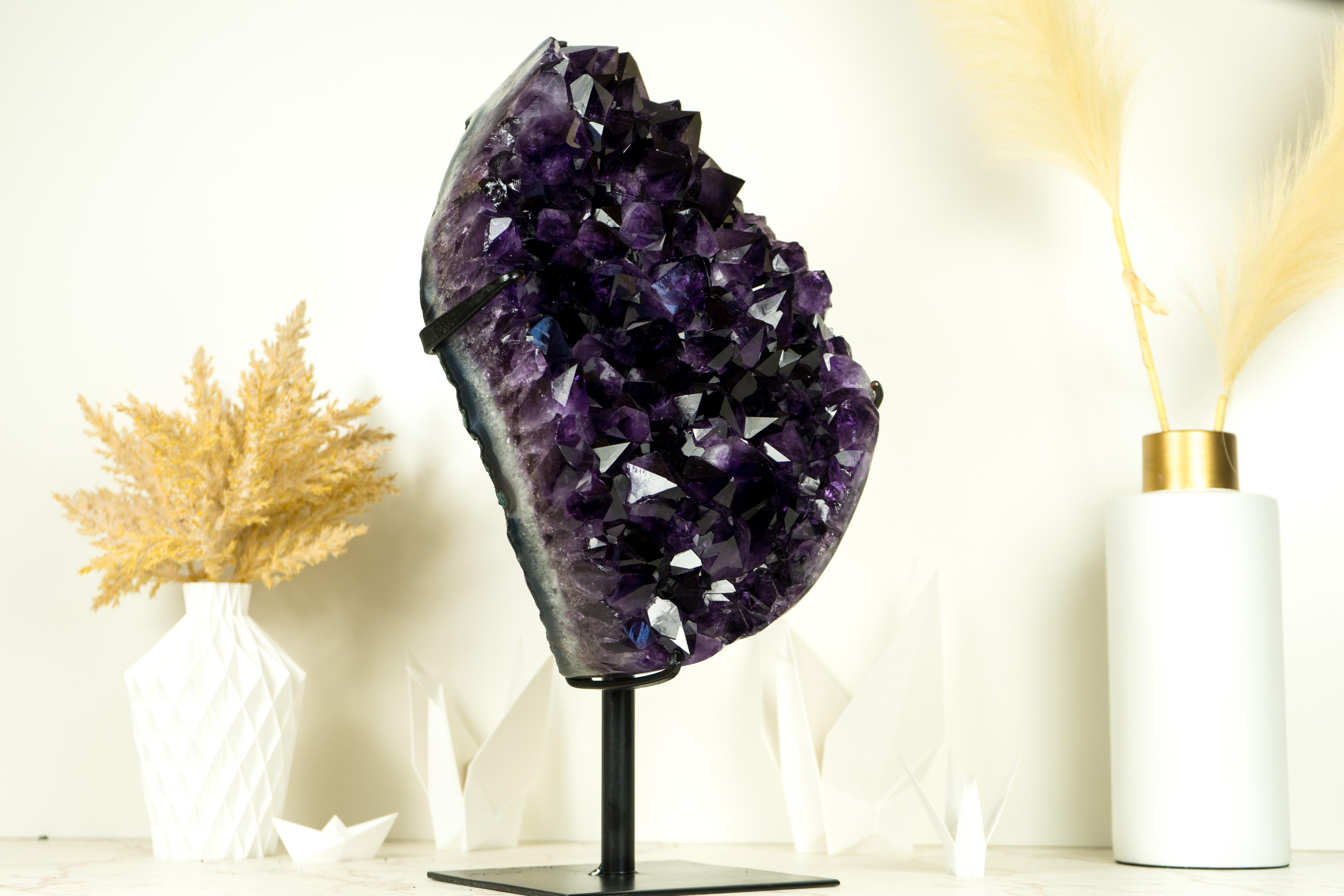 A phenomenal, Large AAA Amethyst Geode Cluster that surely will leave you in awe, this natural Amethyst brings world-class characteristics in an X-Large natural formation that will make it a phenomenal addition to any crystal collection or