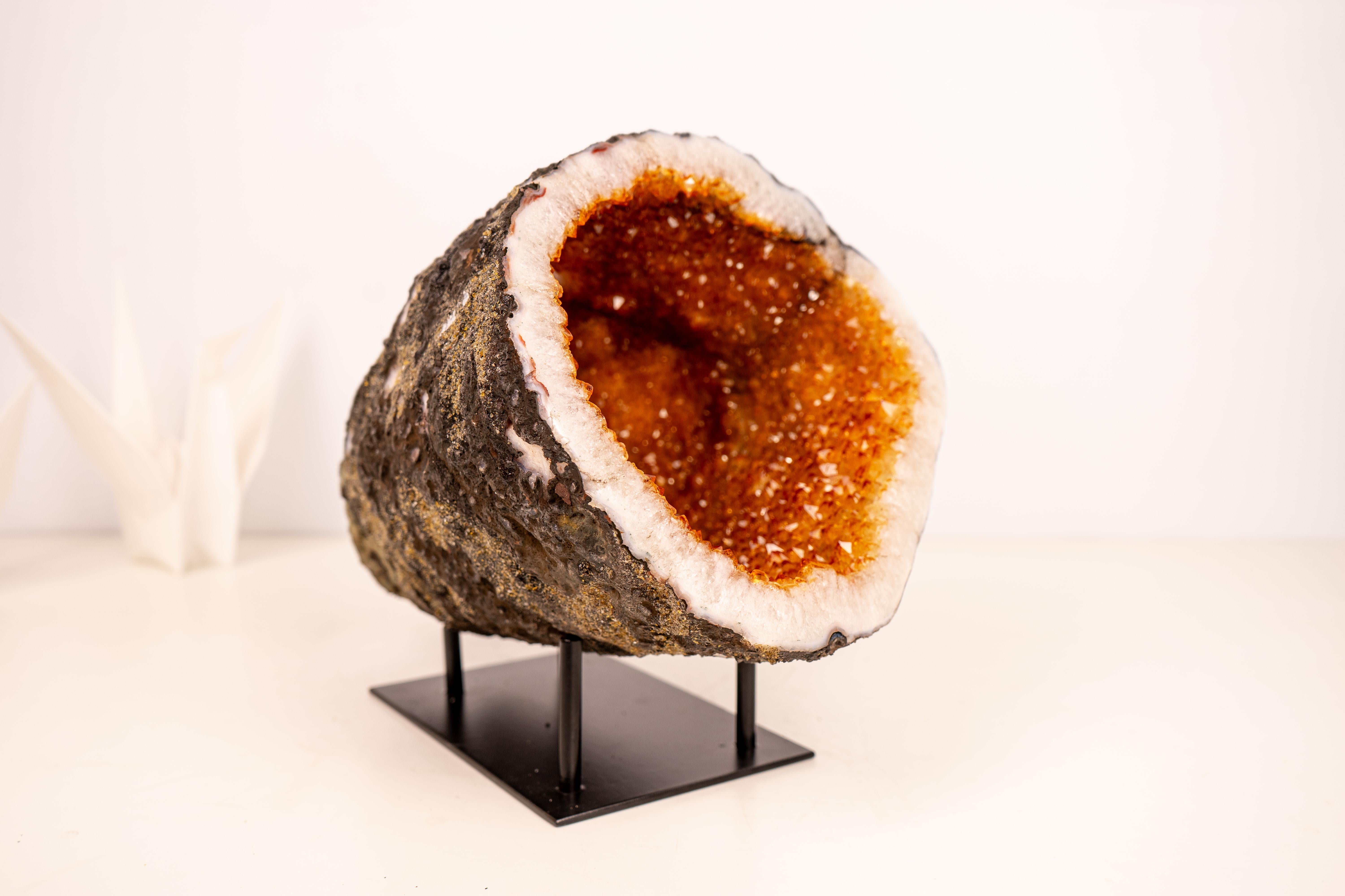 All-Natural Orange Citrine Cave: A Feng Shui Powerhouse

▫️ Description

With rare beauty, this all-natural Citrine geode cave is a highly energetic specimen with many special characteristics. Its interior is completely covered with shiny orange