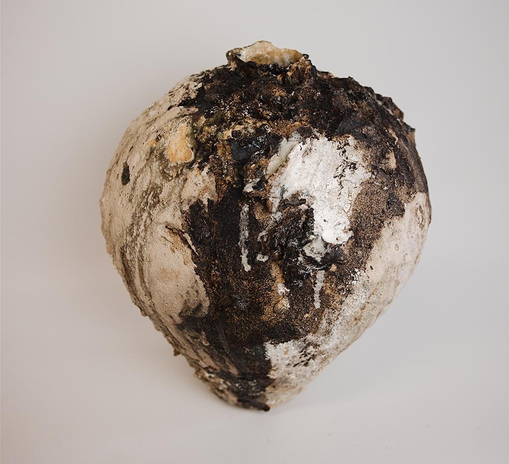19x15 moon vase
NO Glaze inside. 
These are squared off for a unique organic shape
This stunning vase showcases layers of white and cream with textured and varying earth tones, creating a truly unique and one-of-a-kind item. Hand built with
