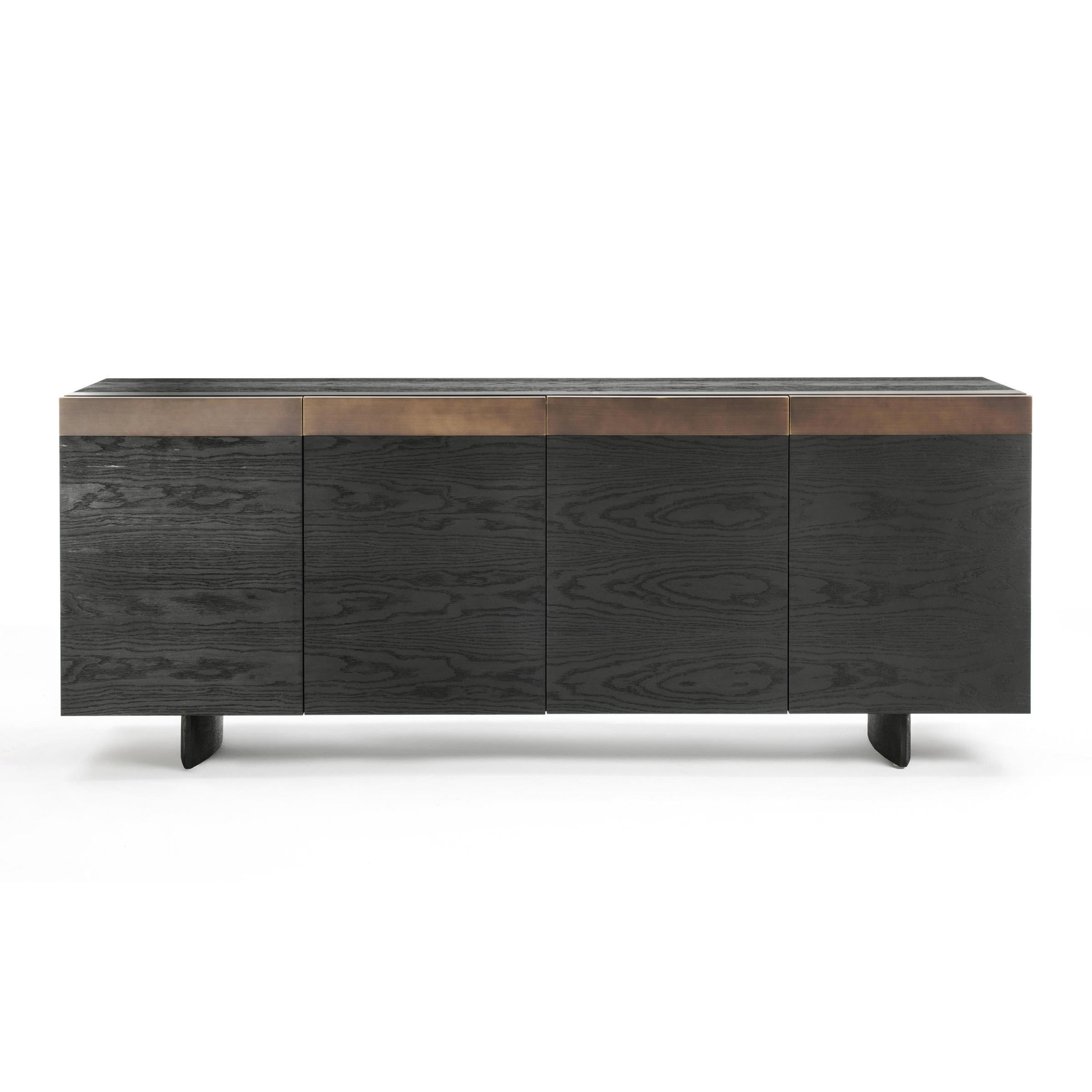 Sideboard all oak black with structure
in solid oak, black pigmented. With steel
details in antique bronze finish. With 4 doors
and 2 central drawers inside. Treated solid 
wood with wax with natural pine extracts.
Also available in walnut, or