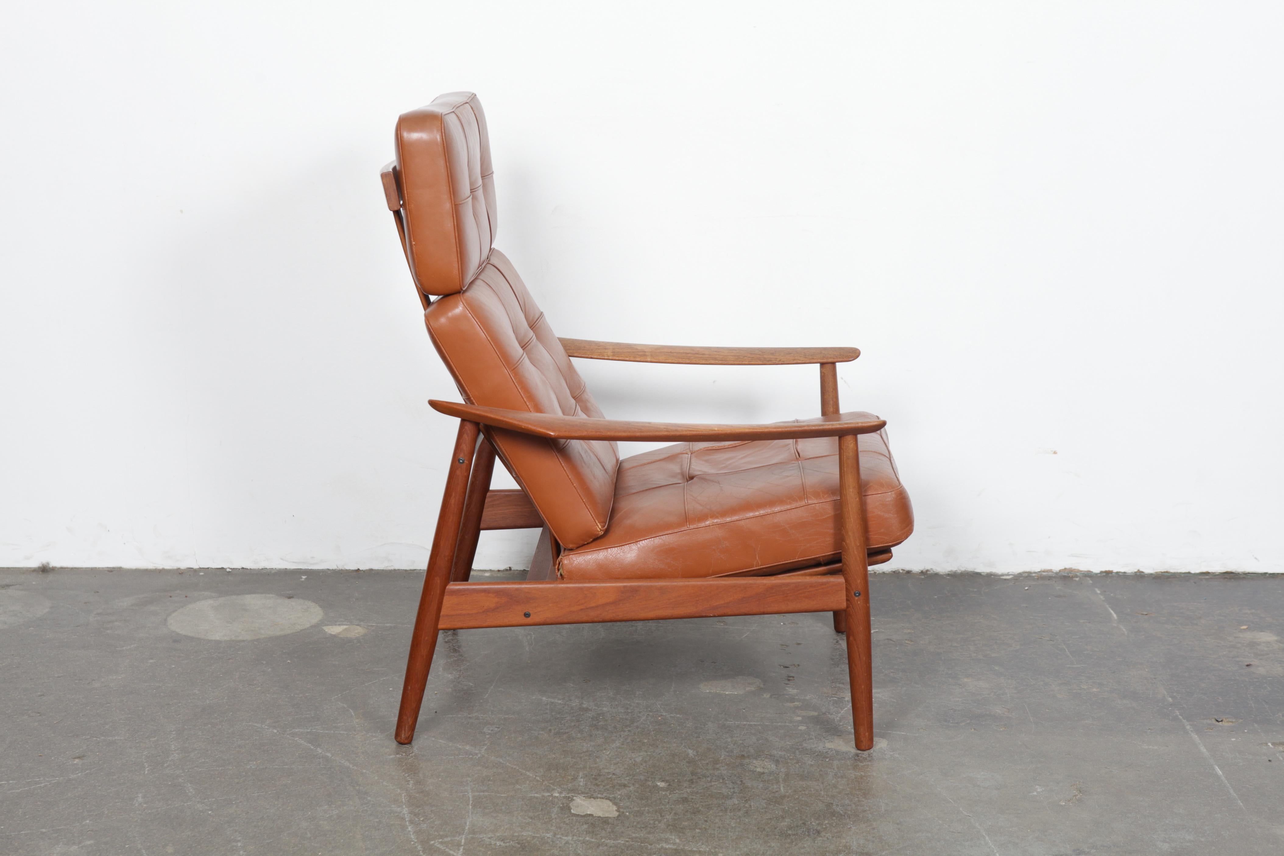 An excellent example of a solid teak lounge chair, 
