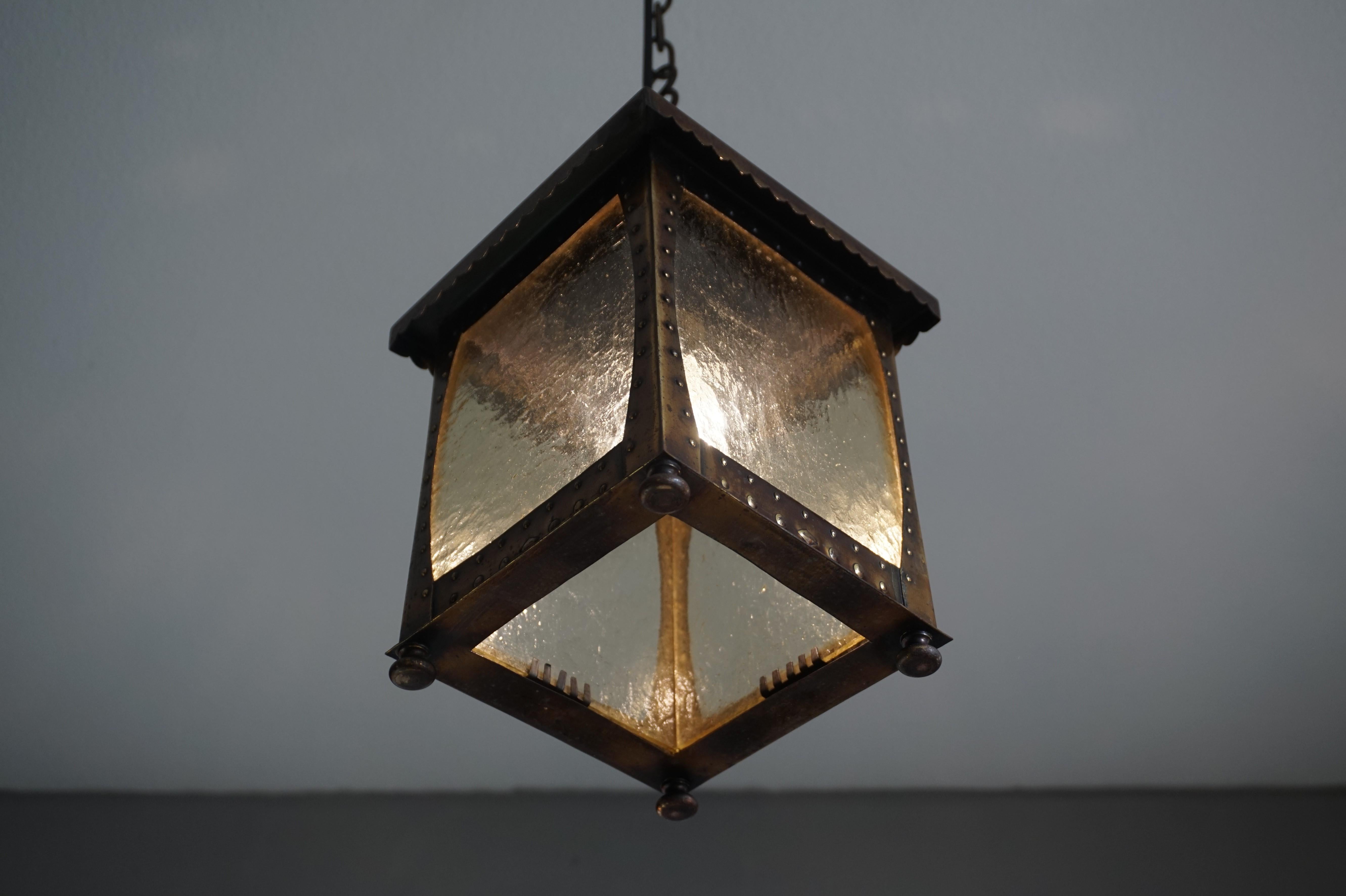 Stunning all handcrafted brass Arts & Crafts pendant.

If you are looking for the ideal pendant to light up your entrance, your bedroom or landing then this handcrafted beauty could be perfect. This European pendant is pure Arts & Crafts in design,