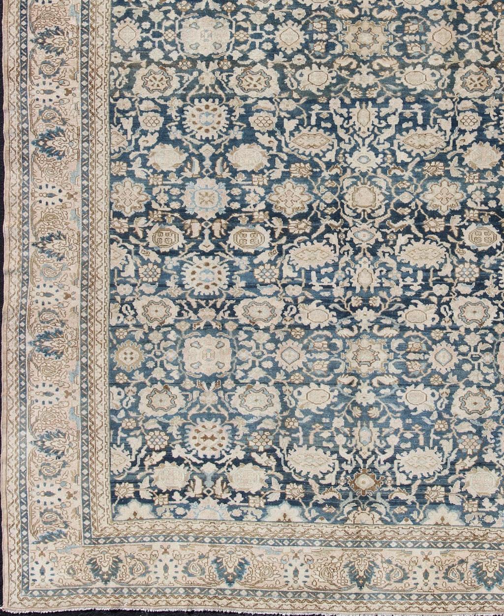 All-over blue floral Persian Hamadan rug in navy blue and earthy tones. Antique Persian rug in navy tones with geometric motifs, rug 19-1101, country of origin / type: Iran / Hamadan, circa 1920.

This large Persian antique Hamadan carpet from 1920