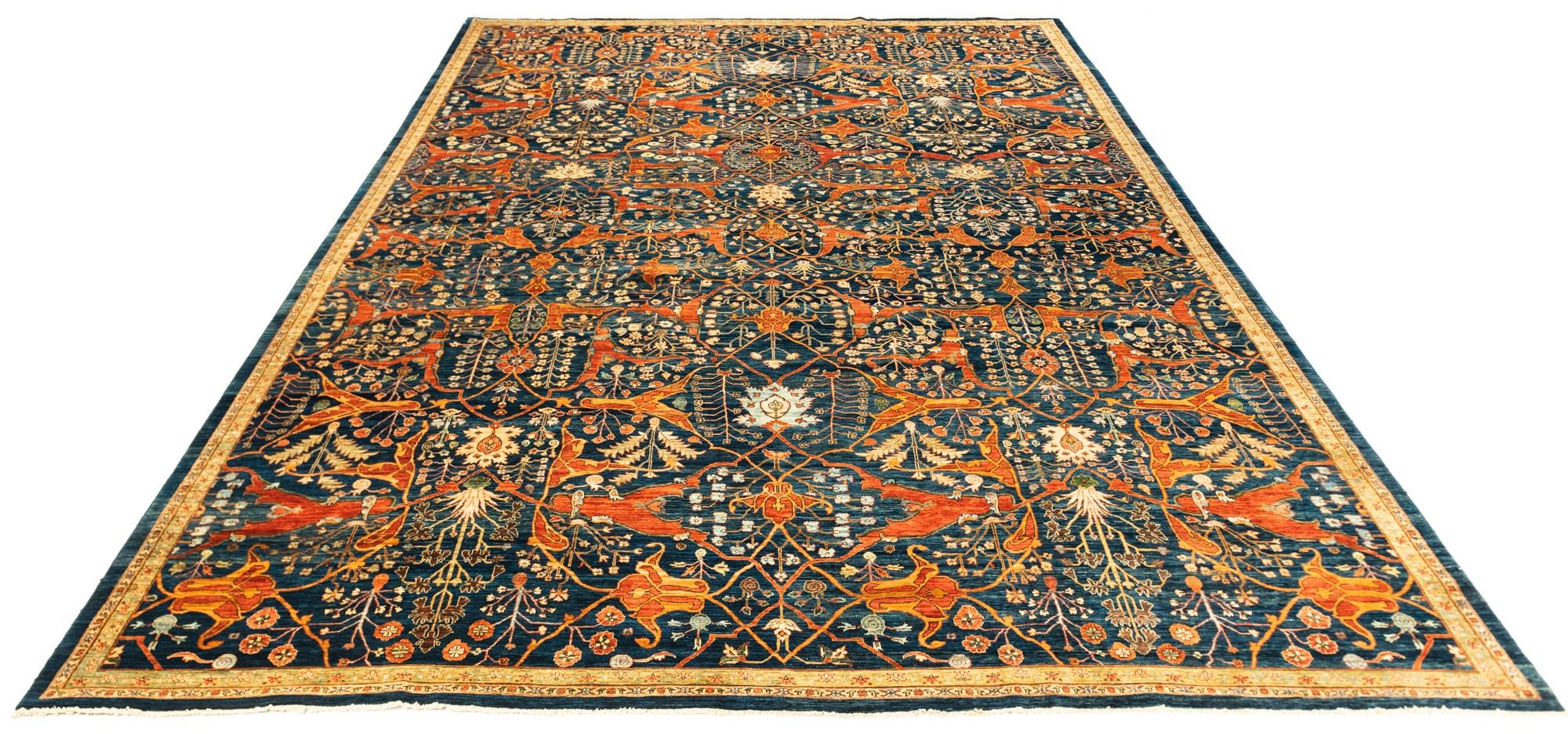 This large carpet takes its design from traditional arabesque motif Kurdish Bidjar carpets from Persia. The rich color palette and unusually narrow border make for an excellent modern take on a traditional style. Handwoven in northern Afghanistan by