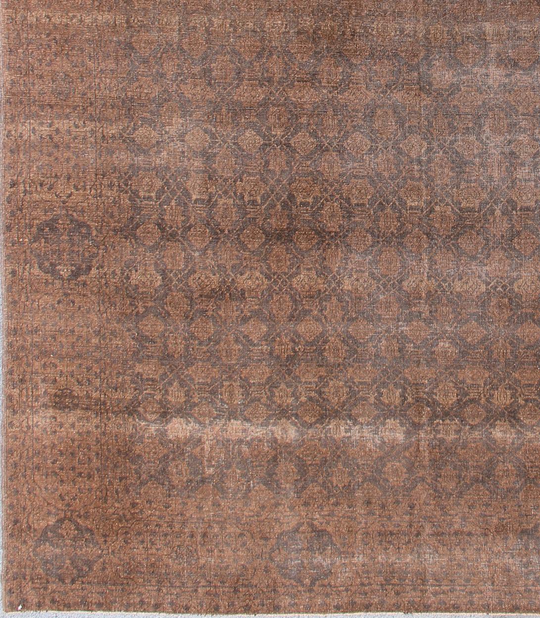 Dark chocolate brown and charcoal vintage Turkish rug ottoman, rug 19-0817, country of origin / type: Turkey / Ottoman

This ottoman design rug from Turkey is finely woven and features an all-over design of various brown highlights and