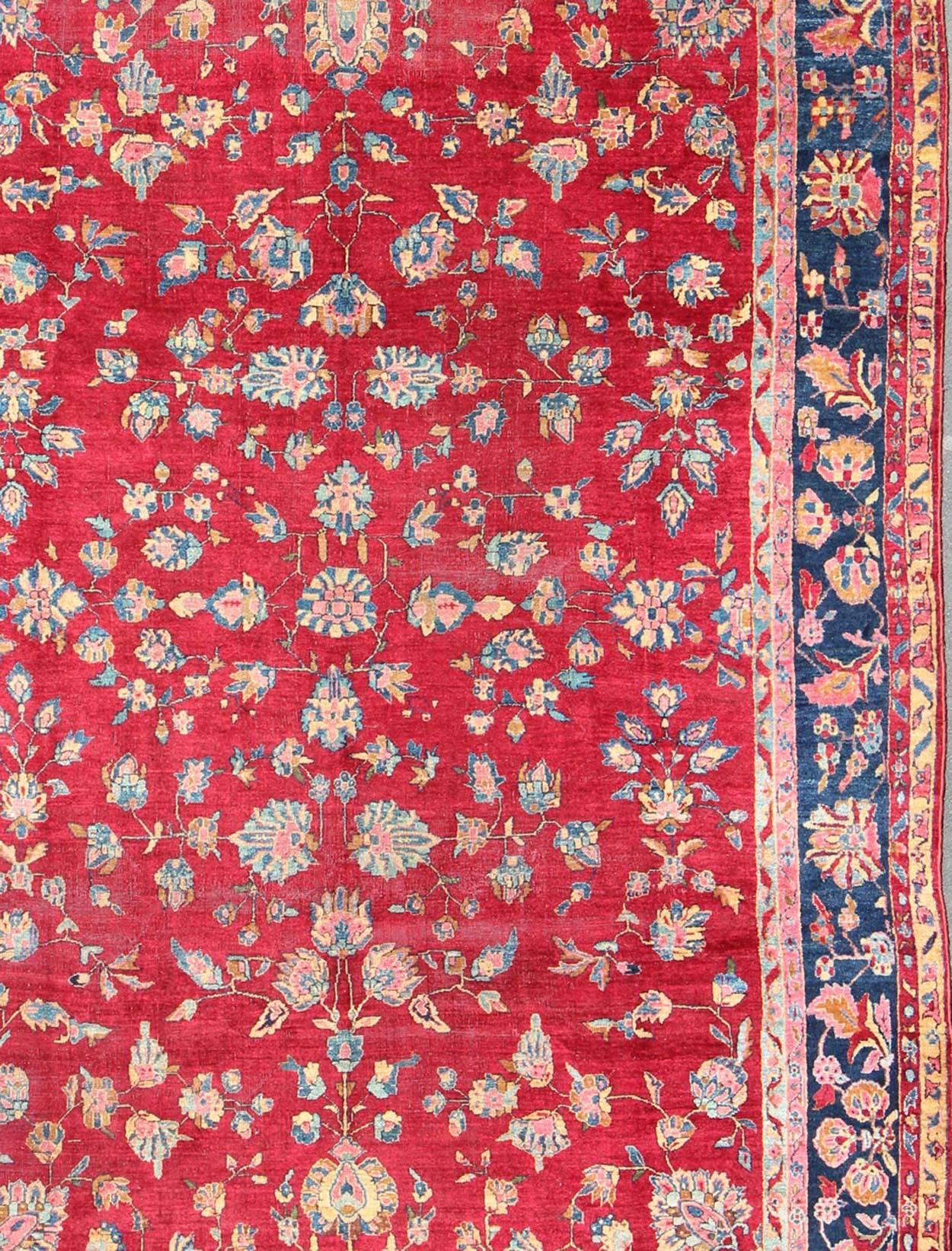 Hand-Knotted All-Over Floral Design Antique Indian Amritsar Rug in Red and Blue Tones For Sale