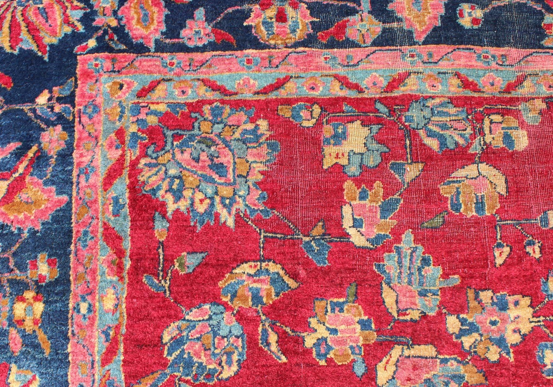 20th Century All-Over Floral Design Antique Indian Amritsar Rug in Red and Blue Tones For Sale