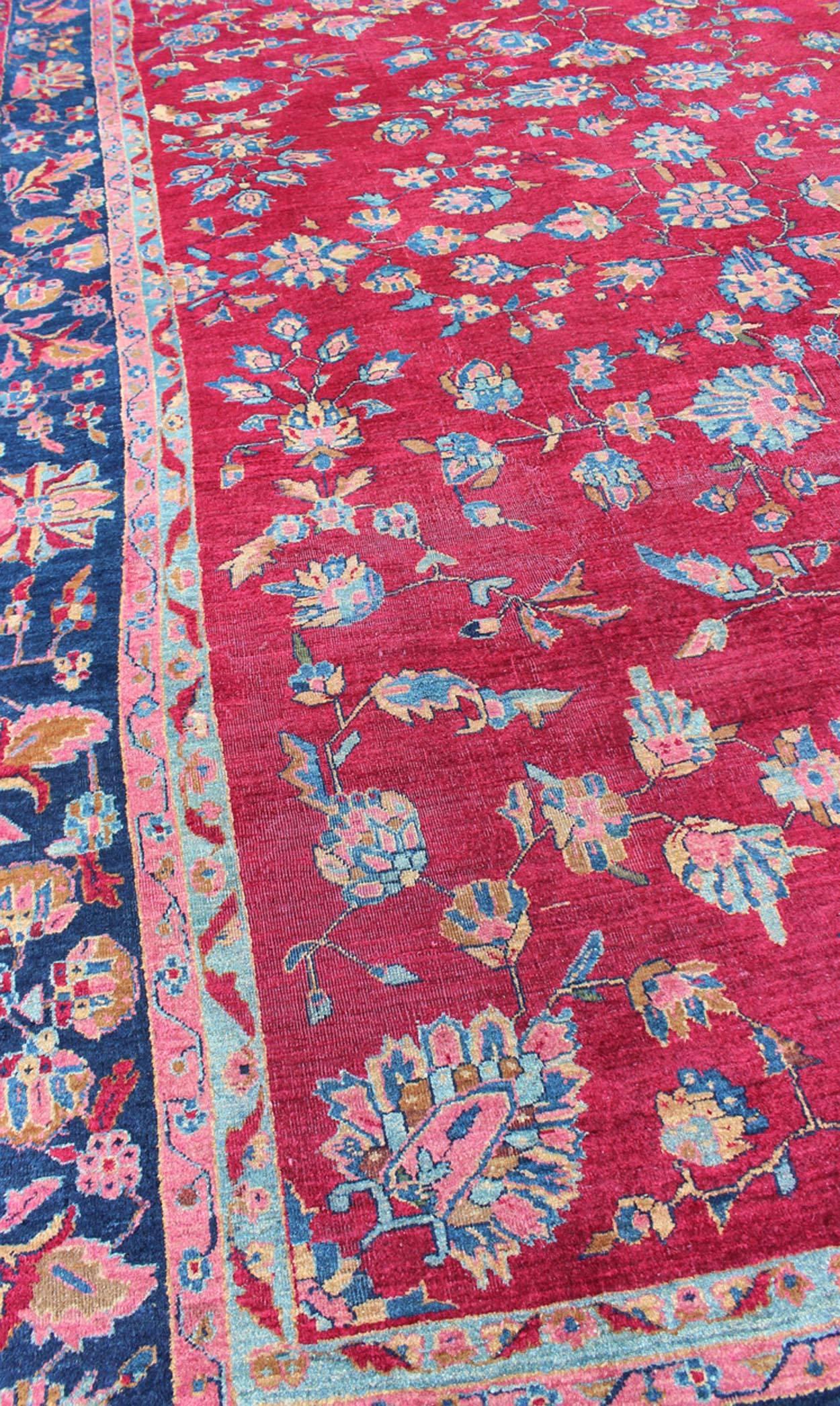 Wool All-Over Floral Design Antique Indian Amritsar Rug in Red and Blue Tones For Sale