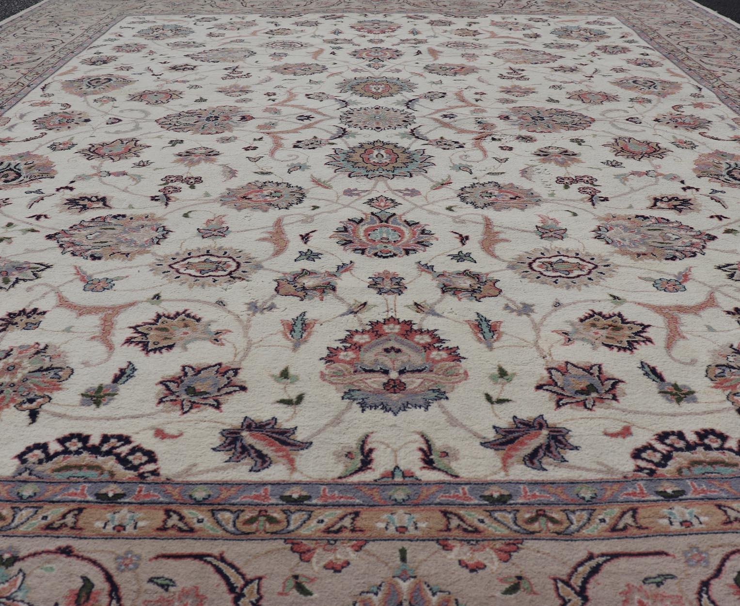  All-Over Floral Design Vintage Persian Tabriz Rug in Soft Colors on Ivory Field. Keivan Woven Arts / rug DSP-2309, country of origin / type: Iran / Tabriz, circa 1960
Measures: 8'0 x 10'6 
This vintage Persian Tabriz carpet (circa 1970) features a