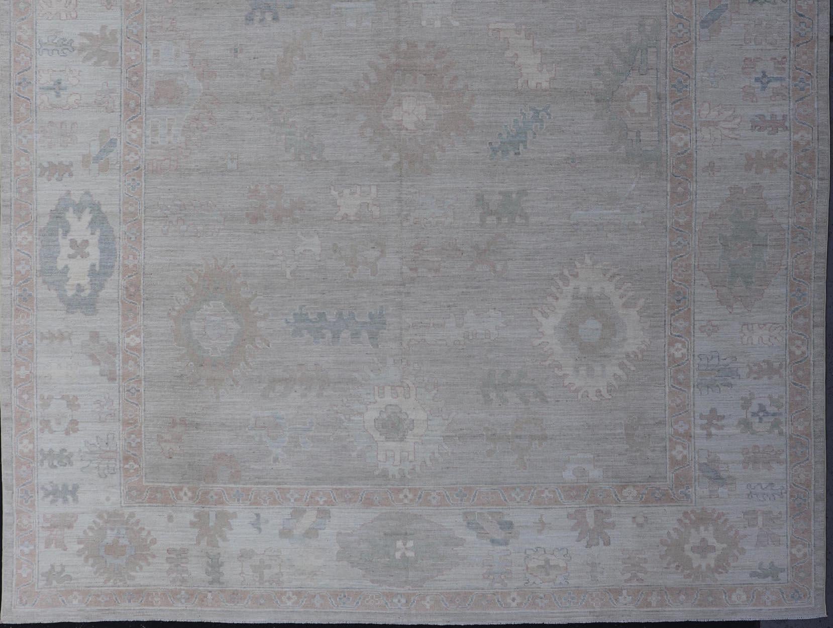 All-Over Floral Modern Oushak with Light Tan Background and Cream Border For Sale 9