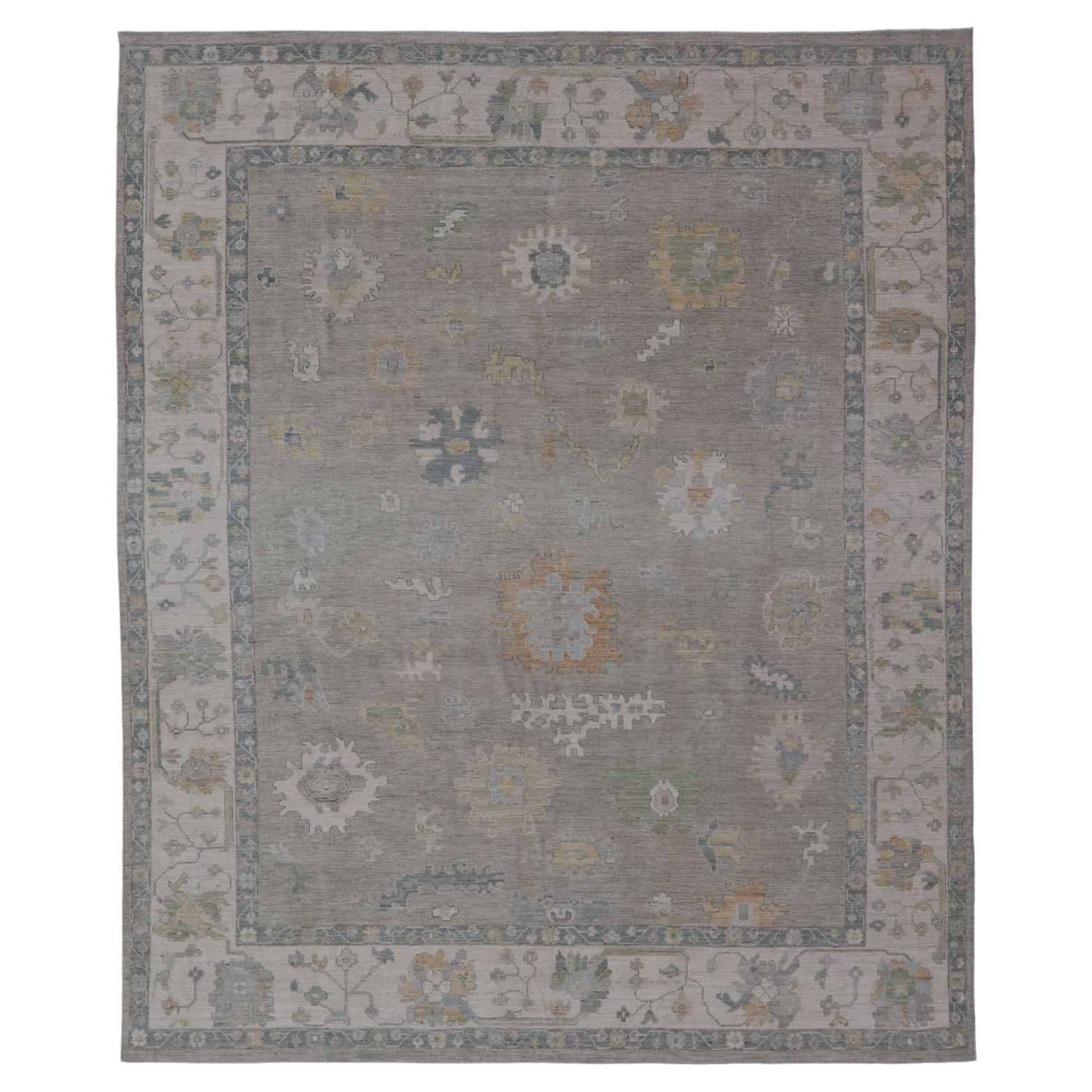 All-Over Floral Modern Oushak with Light Tan Background and Cream Border For Sale