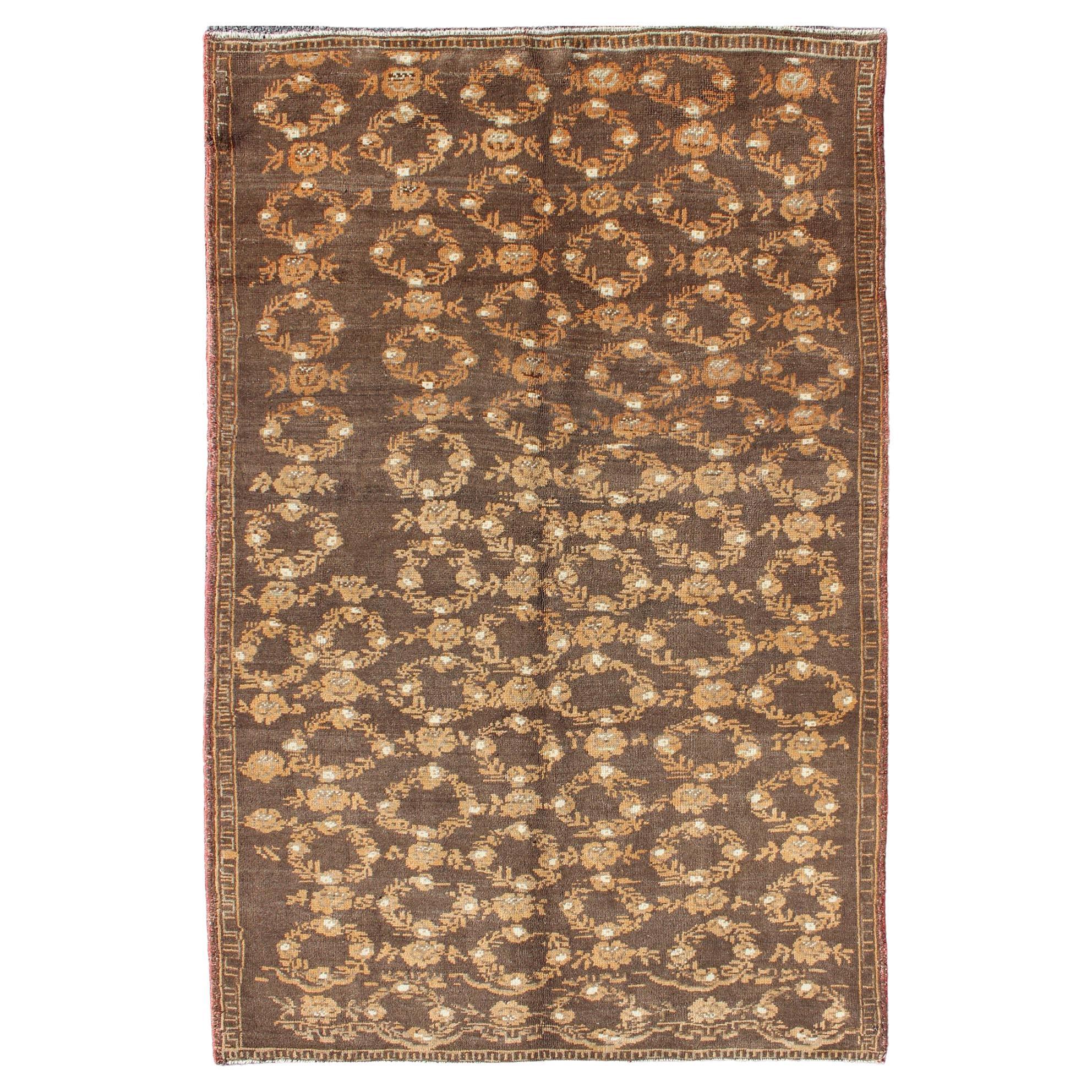 All-Over Floral Wreath Design Turkish Oushak Rug with Brown Background For Sale