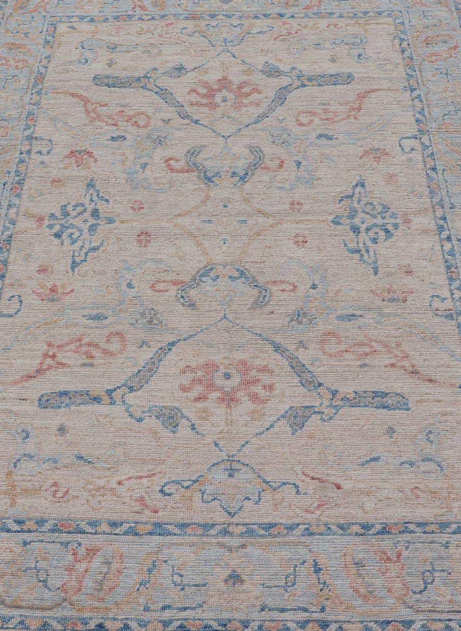 All-Over Hand Knotted Oushak Rug with Arabesque Design in Ivory and Blue Tones In New Condition For Sale In Atlanta, GA
