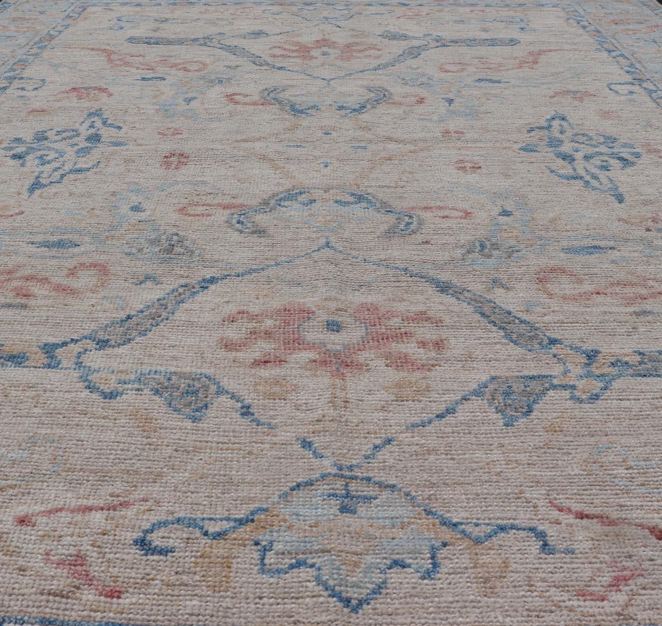 Contemporary All-Over Hand Knotted Oushak Rug with Arabesque Design in Ivory and Blue Tones For Sale