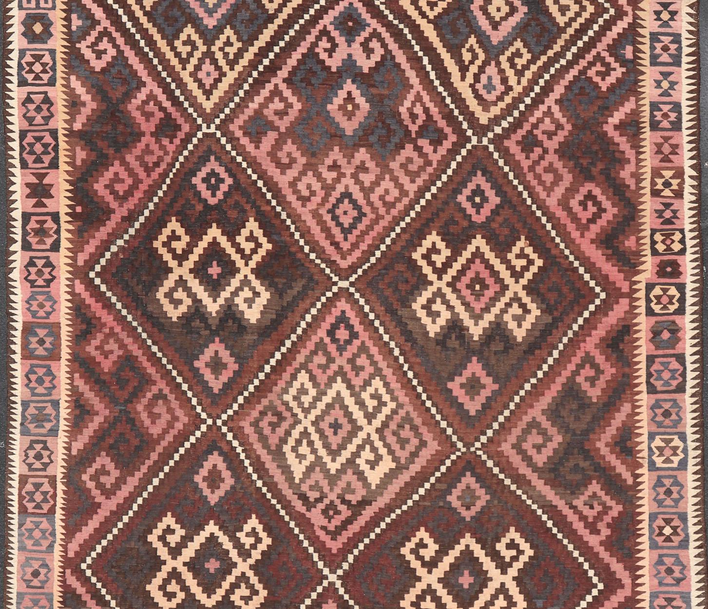 All-Over Geometric Diamond Design Kilim rug with all-over geometric diamond design, Keivan Woven Arts / rug V21-0806, country of origin / type: Afghan / Kilim, circa 1940

Measures: 9'7 x 16'3.