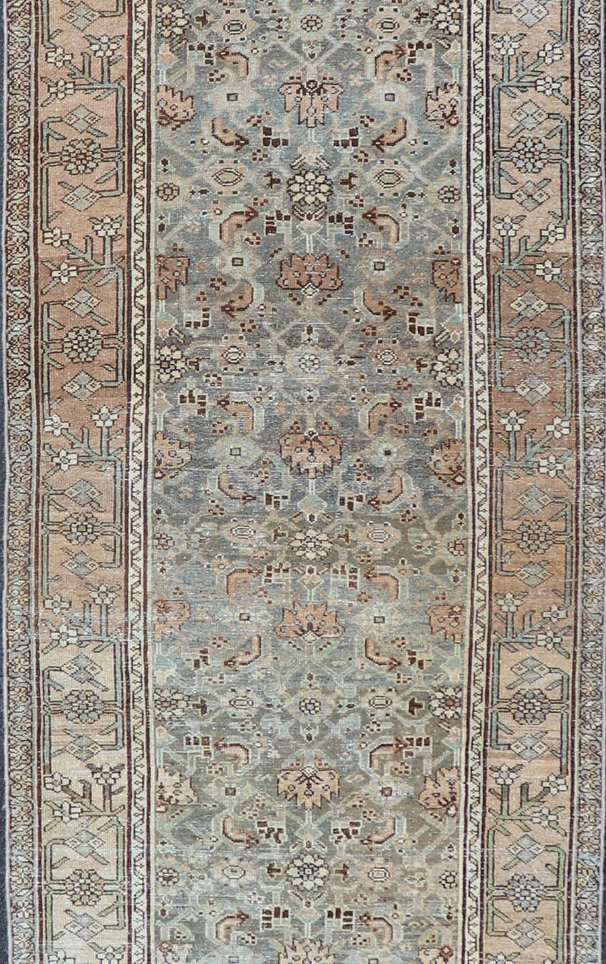 Antique Malayer Persian Runner with Herati pattern in variegated Shades of Blue, gray, green, Taupe sand, brown, Champaign rug SUS-2012-854, country of origin / type: Iran / Malayer, circa 1910

This antique Persian Malayer runner, circa early
