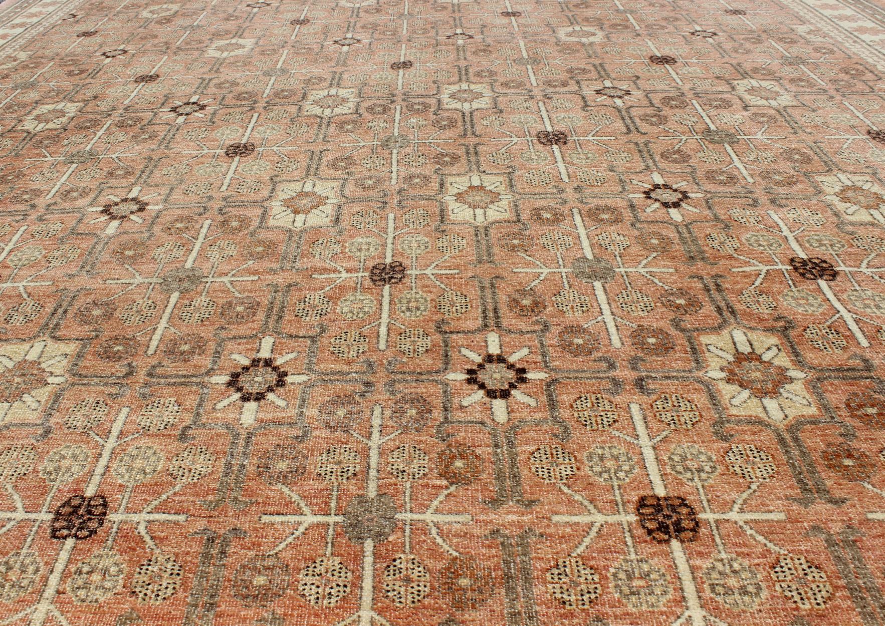 All-Over Design Khotan Rug in Light Tangerine Background. Charcoal, Brown, Green In Excellent Condition For Sale In Atlanta, GA