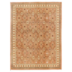 Tappeto Khotan con sfondo mandarino di Keivan Woven Arts, dal design all-over.