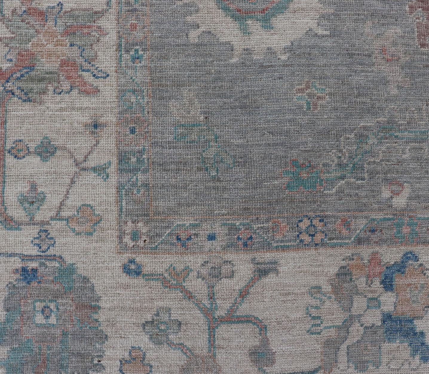Contemporary All Over Modern Floral Oushak with A Light Blue-Gray Field and Border With Color For Sale