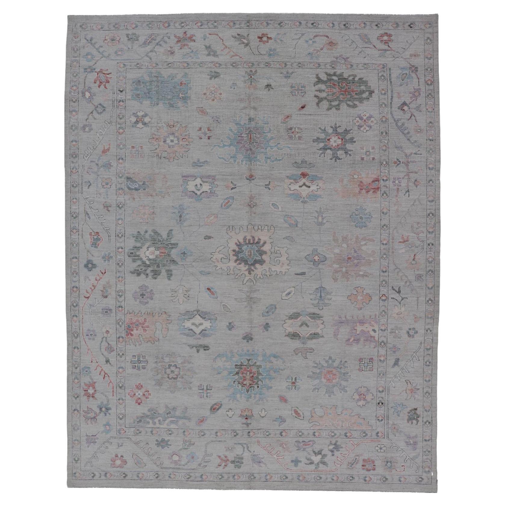 All Over Modern Floral Oushak with A Light Blue-Gray Field and Border With Color For Sale