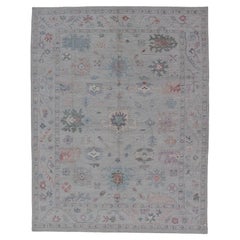 All Over Modern Floral Oushak with A Light Blue-Gray Field and Border With Color