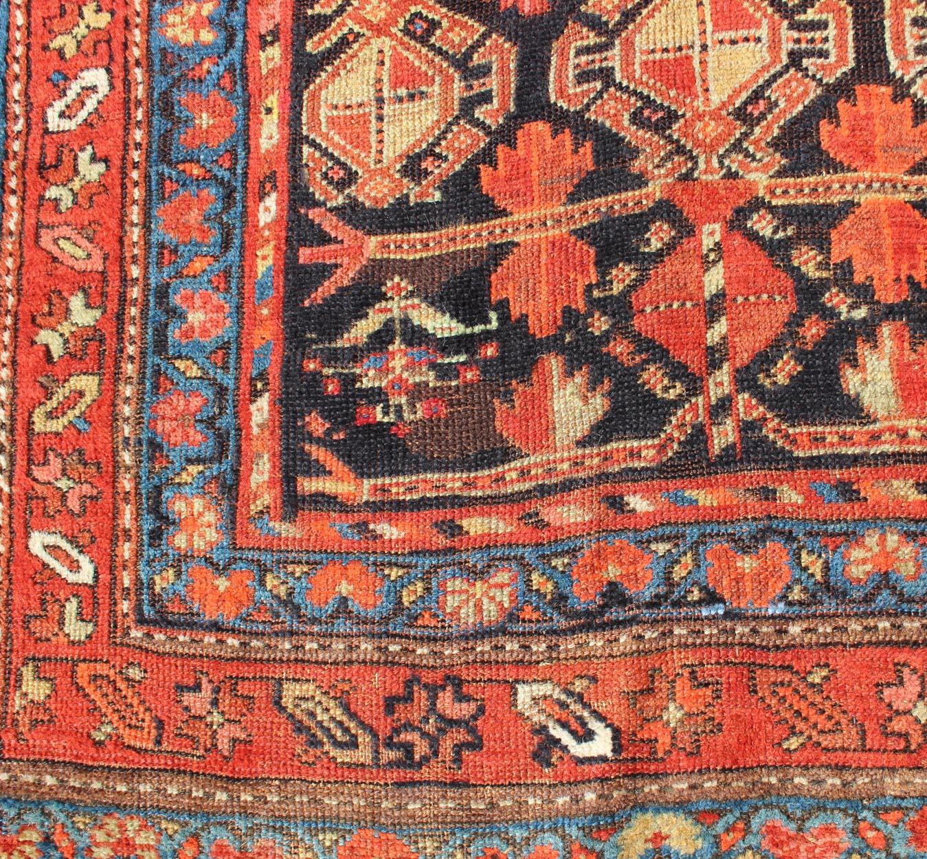 Wool All-Over Tribal Design Antique Persian Kurdish Rug in Blue & Red For Sale