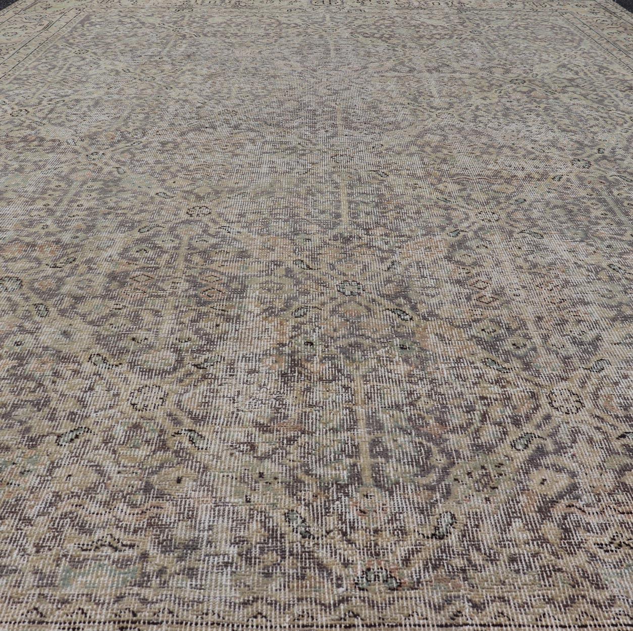 Hand-Knotted All-Over Vintage Turkish Distressed Rug in Cream, Lavender, Taupe, and Green For Sale