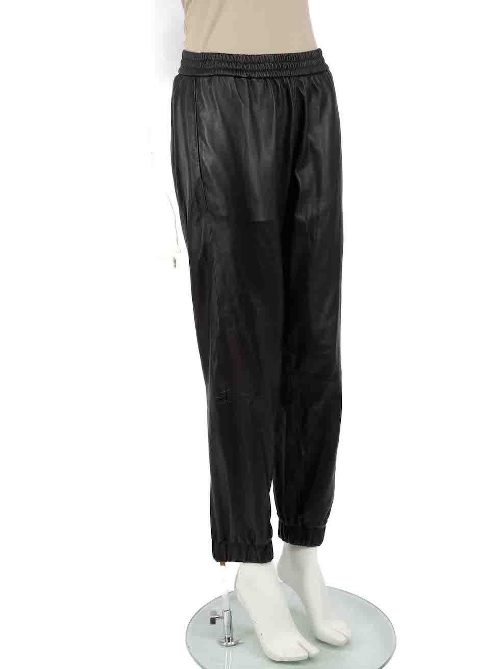 CONDITION is Very good. Hardly any visible wear to trousers is evident on this used All Saints designer resale item.
 
 
 
 Details
 
 
 Model: Jen Cuff Joggers
 
 Black
 
 Leather
 
 Trousers
 
 Tapered
 
 High rise
 
 Elasticated cuffs
 
