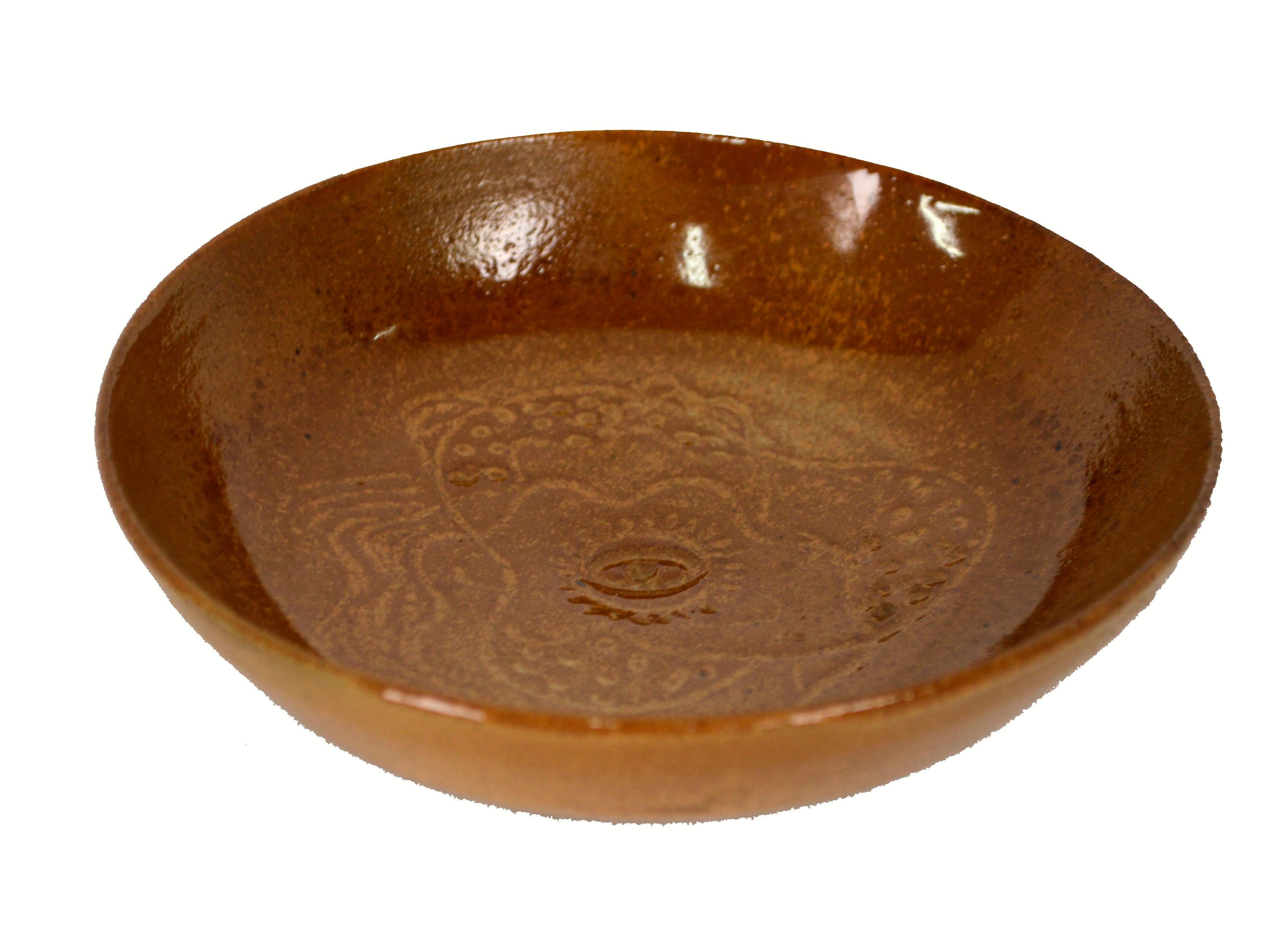 Unique small hand-made terracotta bowl, incised with a decorative all seeing eye pattern, by California potter Bruce Carlton Anderson (American, 1915-1986). This earthy piece is in the style of Marguerite Wildenhain of the Pond Farm, where Anderson