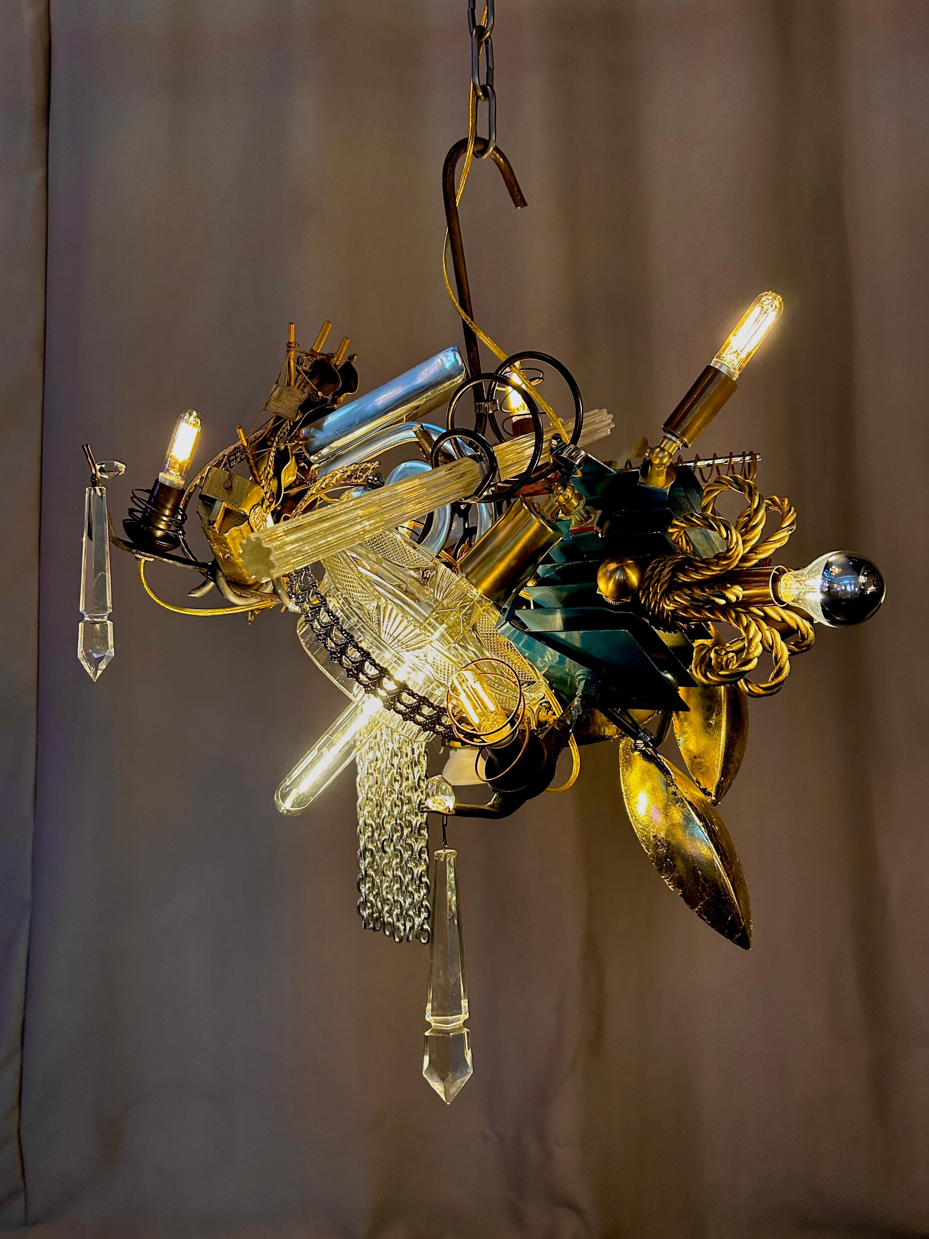 What elevates Warren Muller's lit sculptural chandeliers from mere crafstmanship is his visionary outlook. Warren selects, juxtaposes objects to incorporate an iconography of myths, fairy tales and personal idiosyncrasies into 