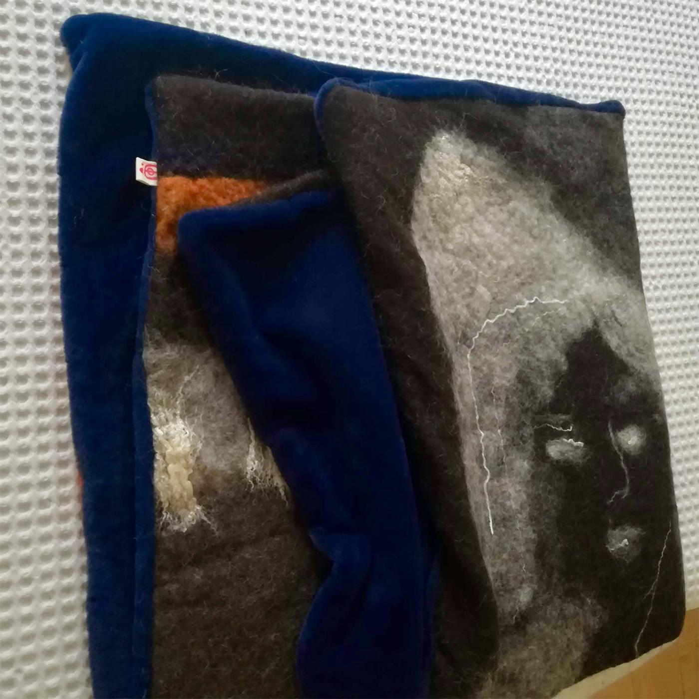 A charming and stylish example of nuno felting in shades of blue and neutral tones, the all the same all different tapestry is crafted using carded wool, silk, hemp and cotton gauze. Using a massaging technique, it is difficult to control the effect